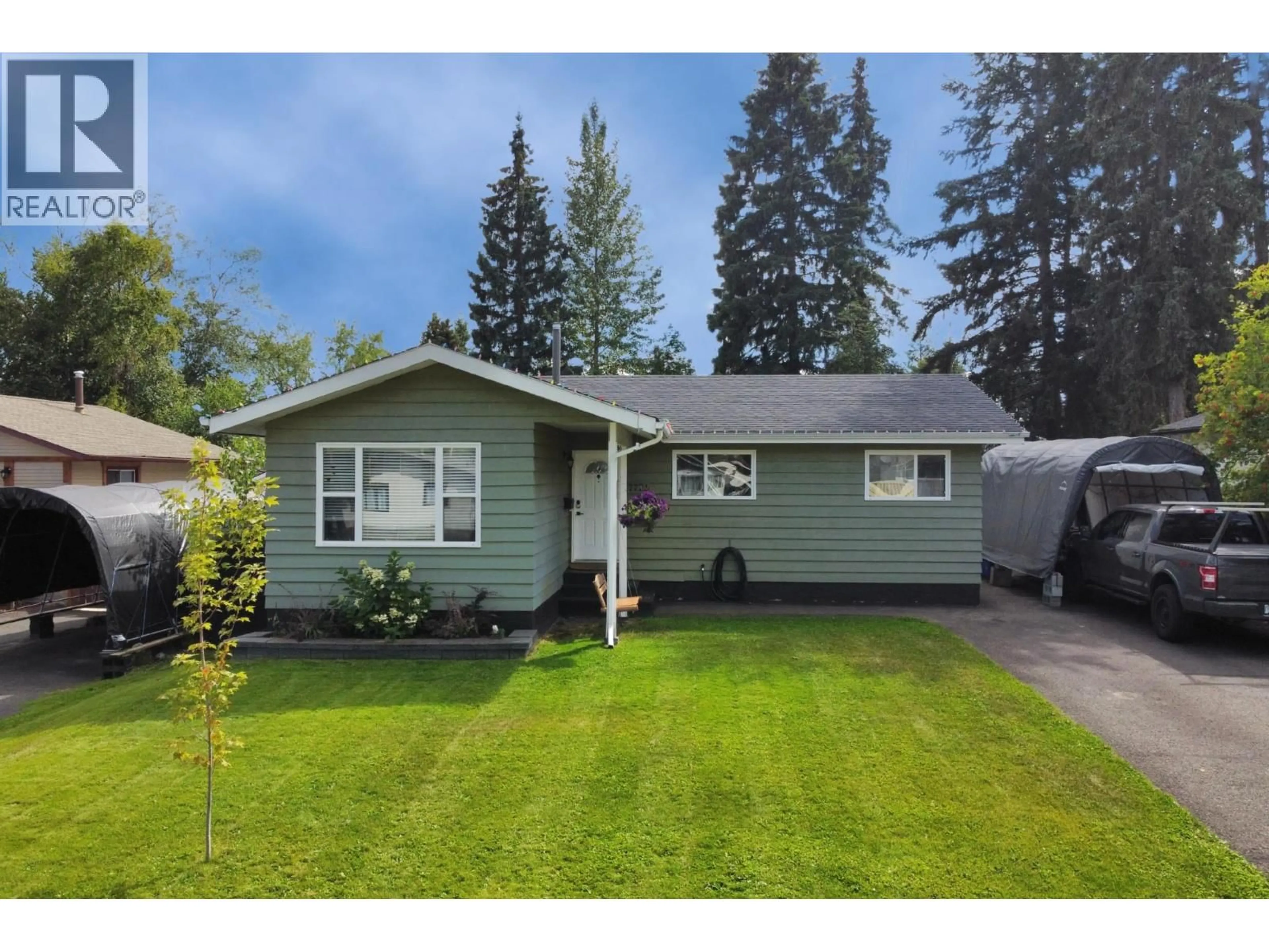 Home with vinyl exterior material, street for 7725 KINGSLEY CRESCENT, Prince George British Columbia V2N3M9