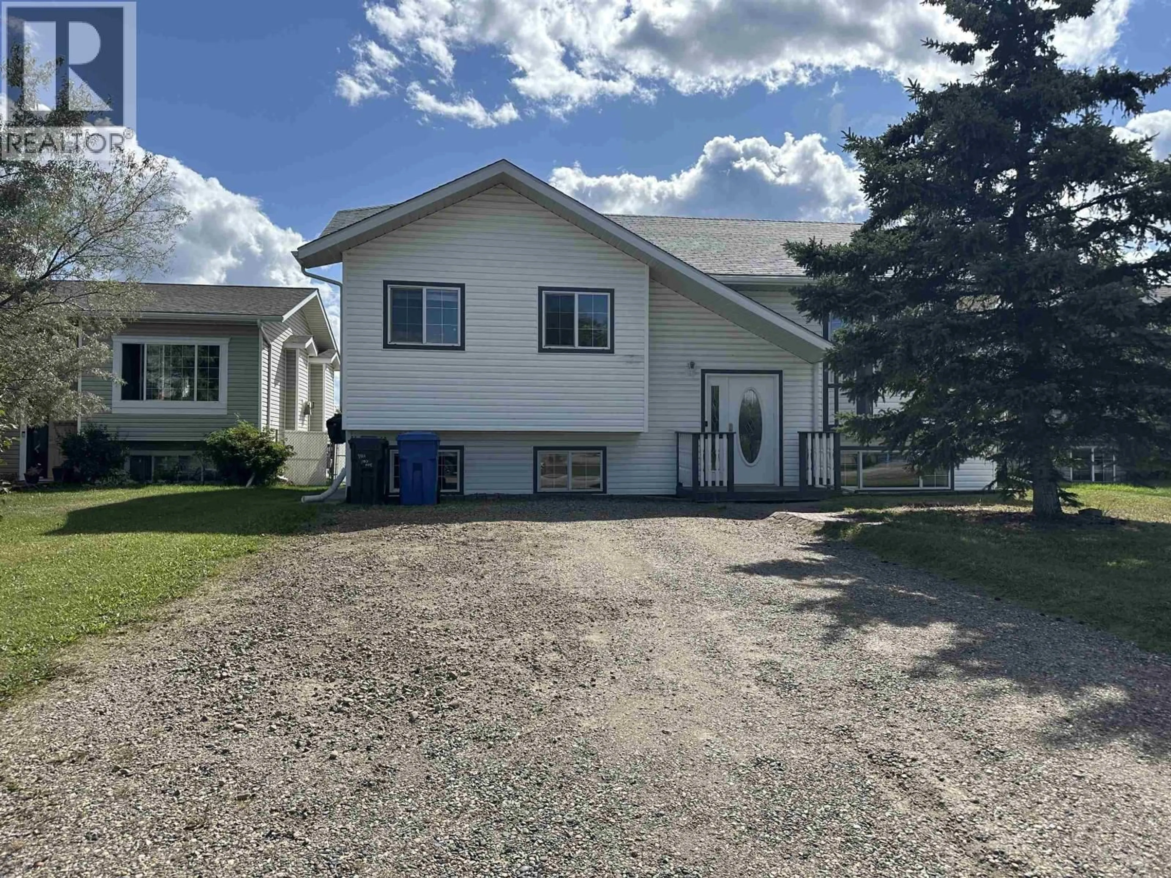 A pic from outside/outdoor area/front of a property/back of a property/a pic from drone, street for 9111 107 AVENUE, Fort St. John British Columbia V1J2P1