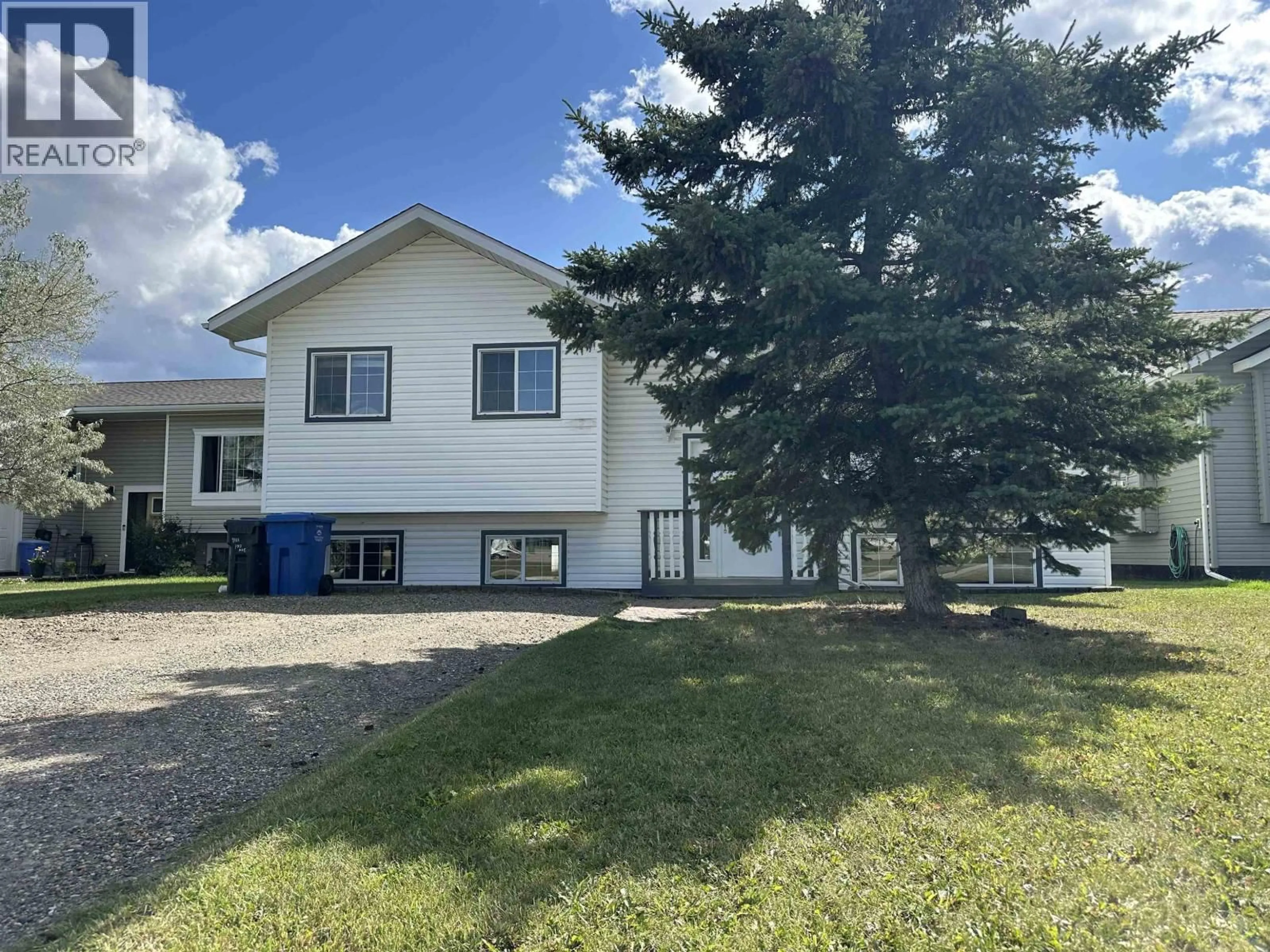 Home with vinyl exterior material, unknown for 9111 107 AVENUE, Fort St. John British Columbia V1J2P1