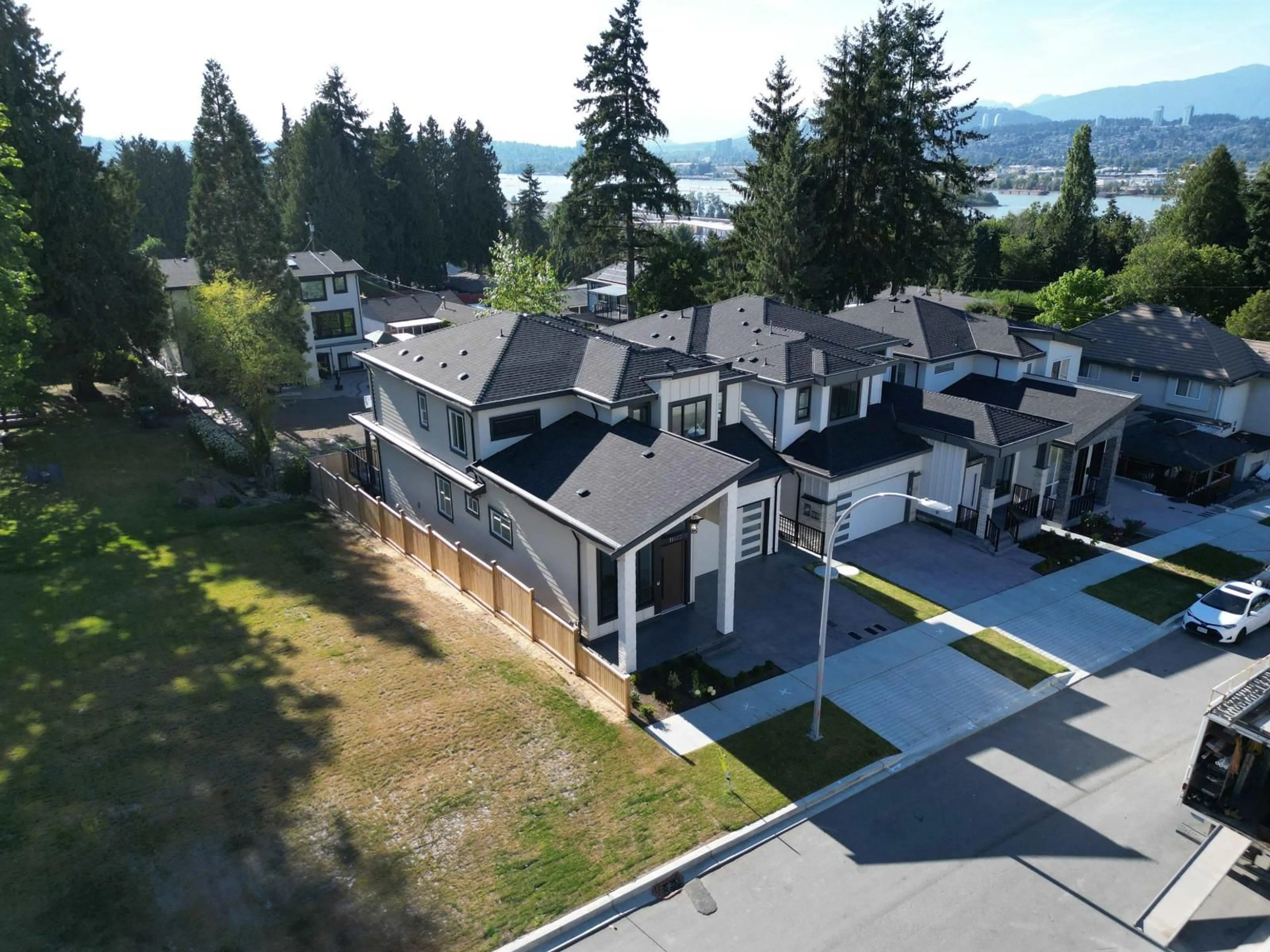 A pic from outside/outdoor area/front of a property/back of a property/a pic from drone, mountain view for 11463 138A, Surrey British Columbia V3R0J3