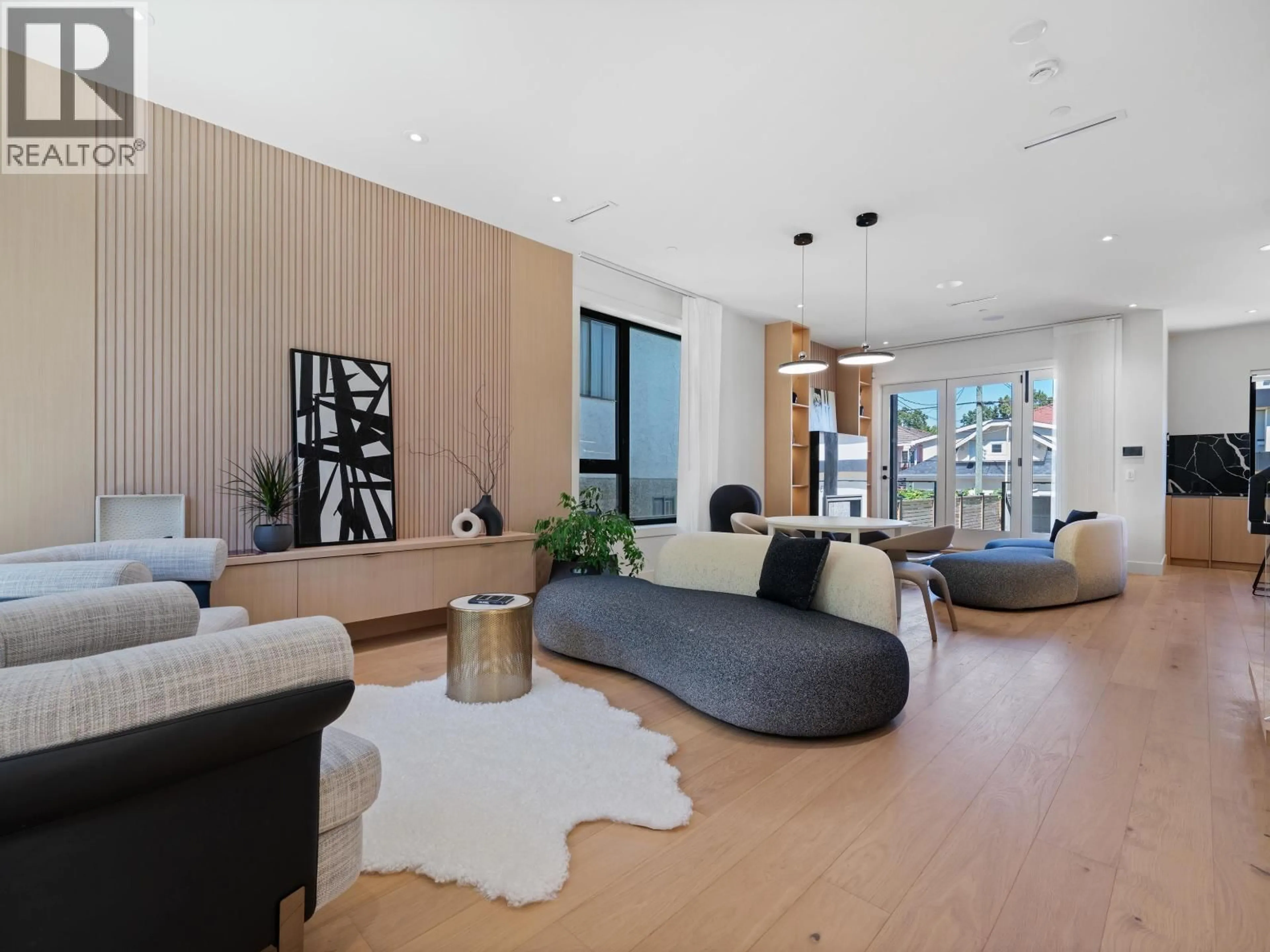 Living room with furniture, wood/laminate floor for 2111 46TH AVENUE, Vancouver British Columbia V5P1P3