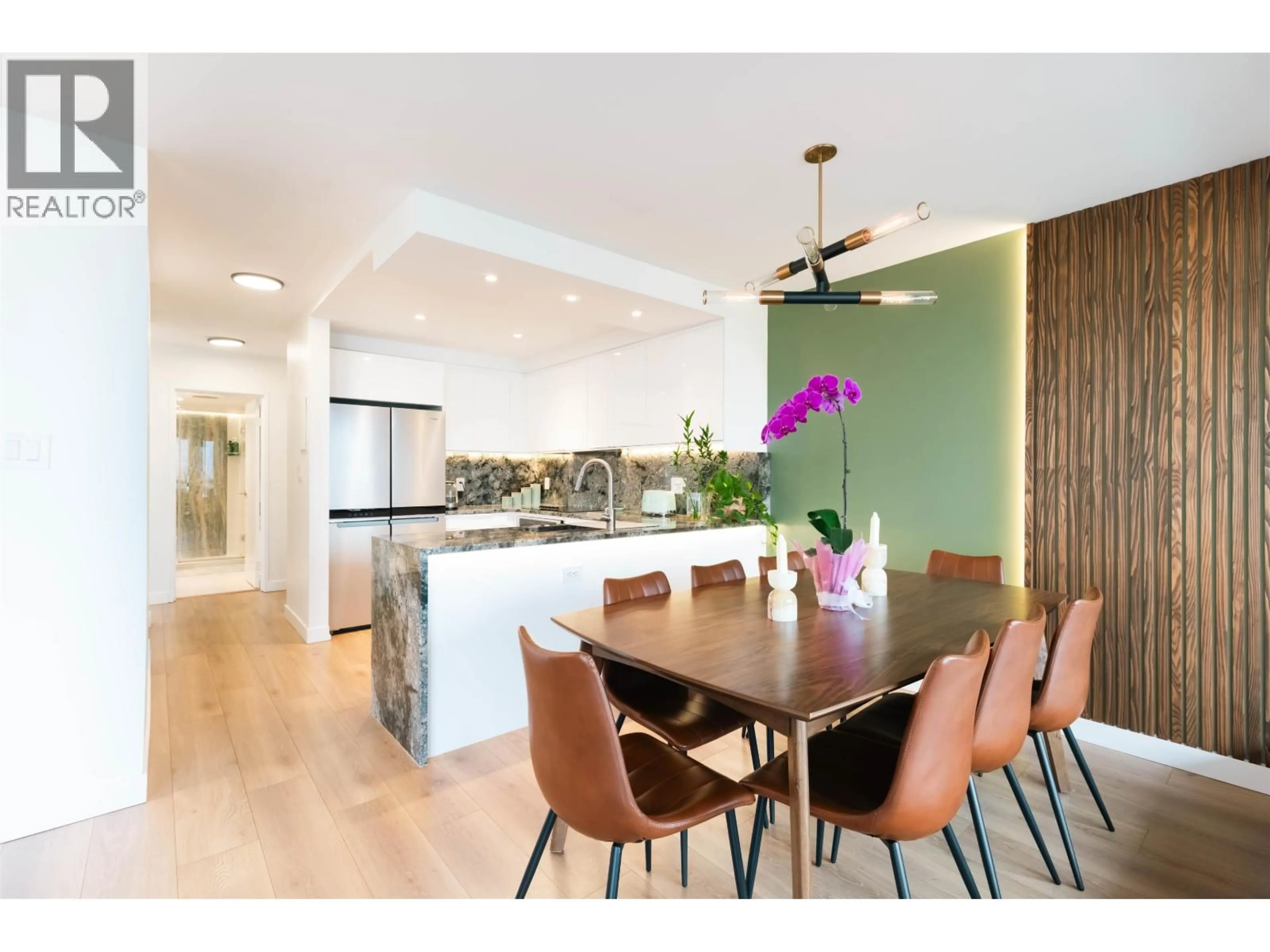 Open concept kitchen, wood/laminate floor for 705 - 444 LONSDALE AVENUE, North Vancouver British Columbia V7M3H5