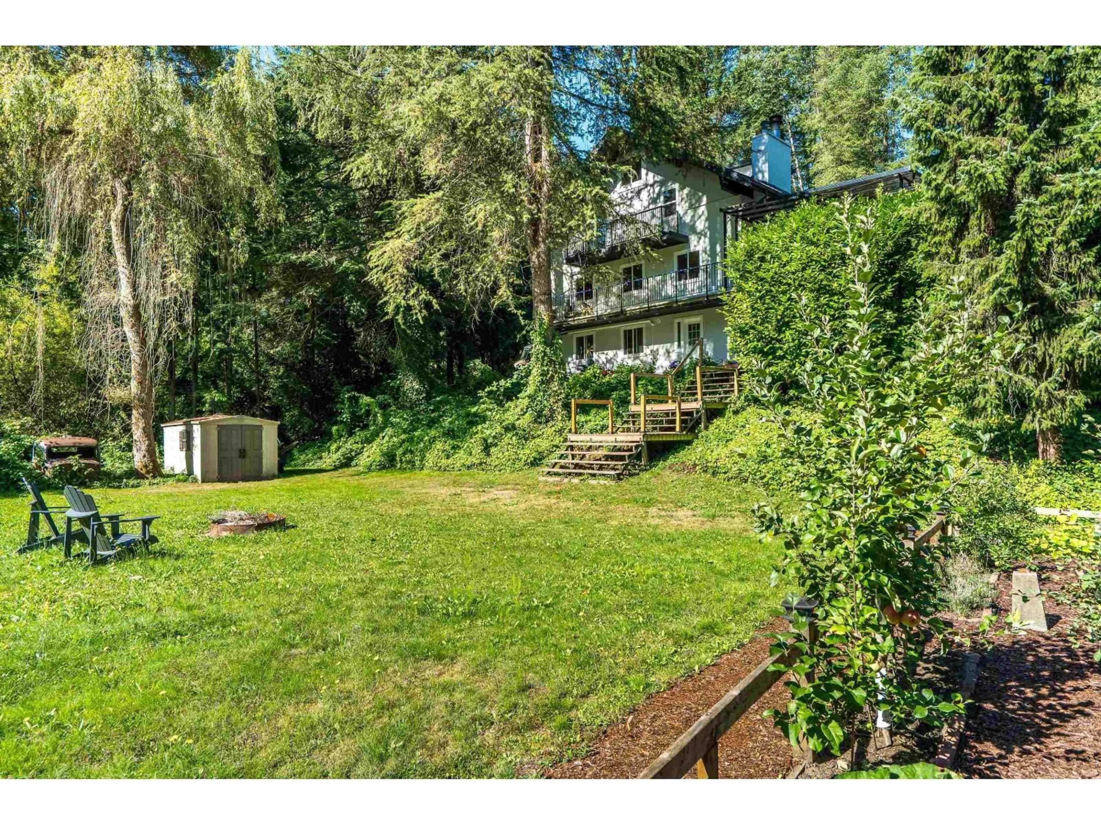 A pic from outside/outdoor area/front of a property/back of a property/a pic from drone, forest/trees view for 23182 RAWLISON, Langley British Columbia V1M3R7