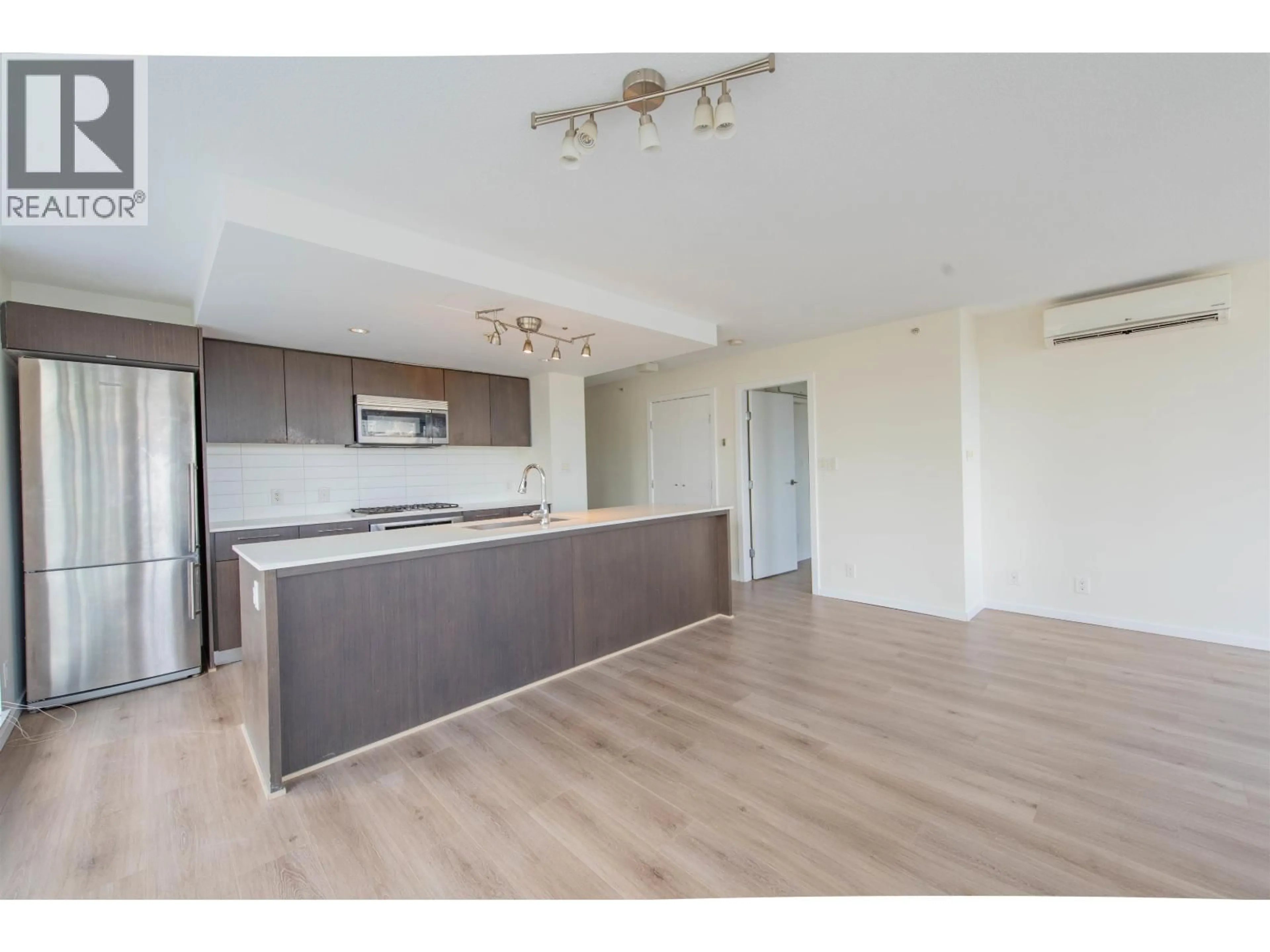 Open concept kitchen, wood/laminate floor for 511 - 7988 ACKROYD ROAD, Richmond British Columbia V6X0K6