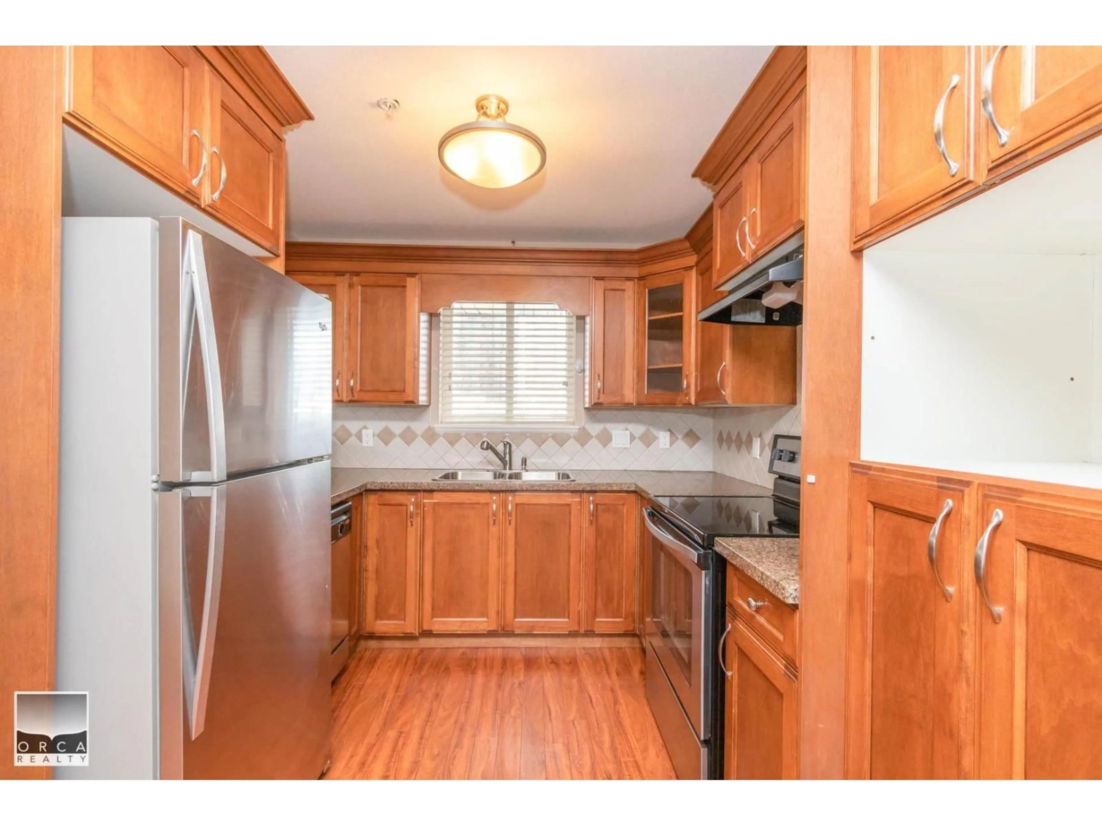 Standard kitchen, wood/laminate floor for 306 - 10289 133, Surrey British Columbia V3T0B1