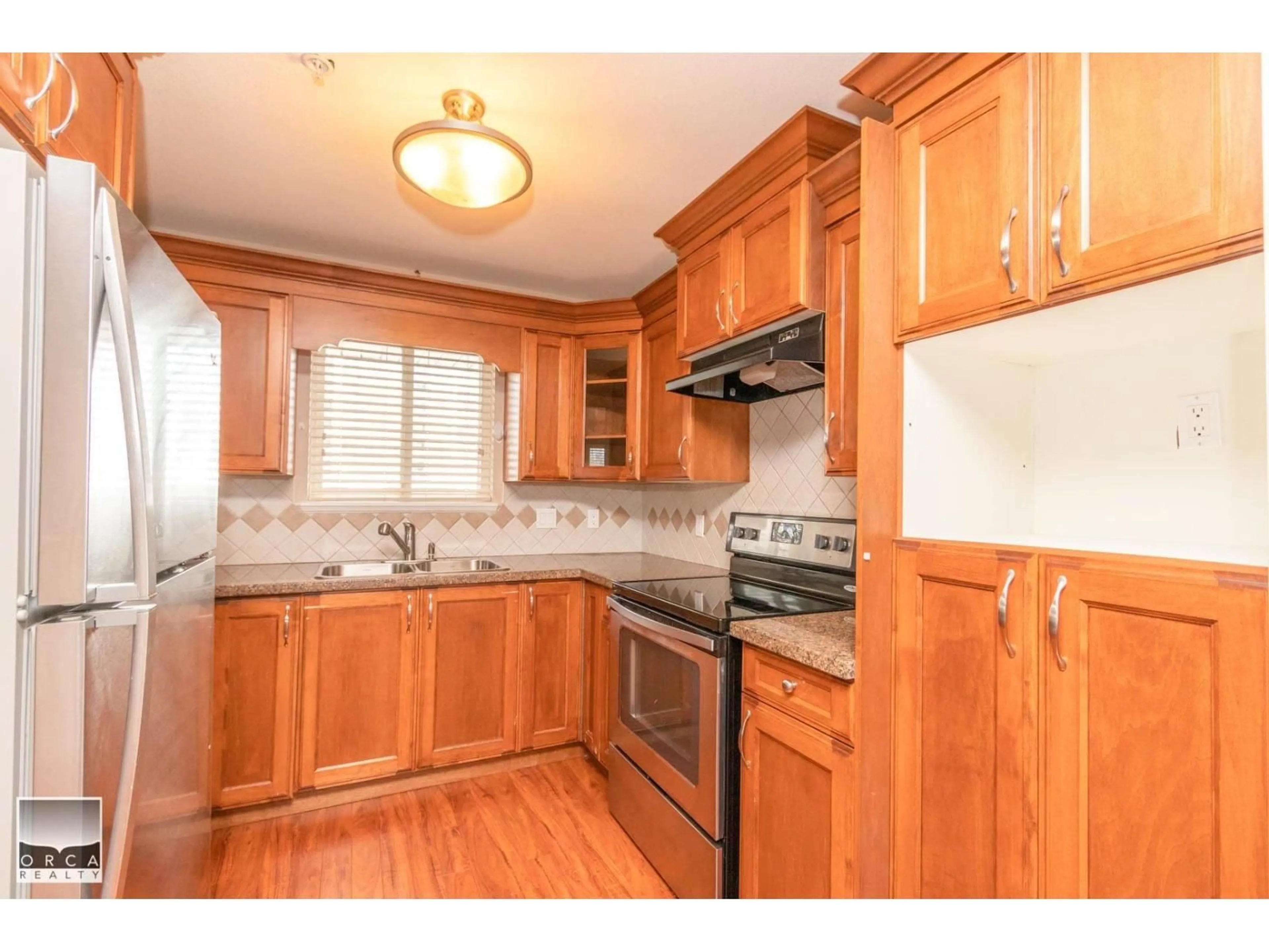 Standard kitchen, wood/laminate floor for 306 - 10289 133, Surrey British Columbia V3T0B1