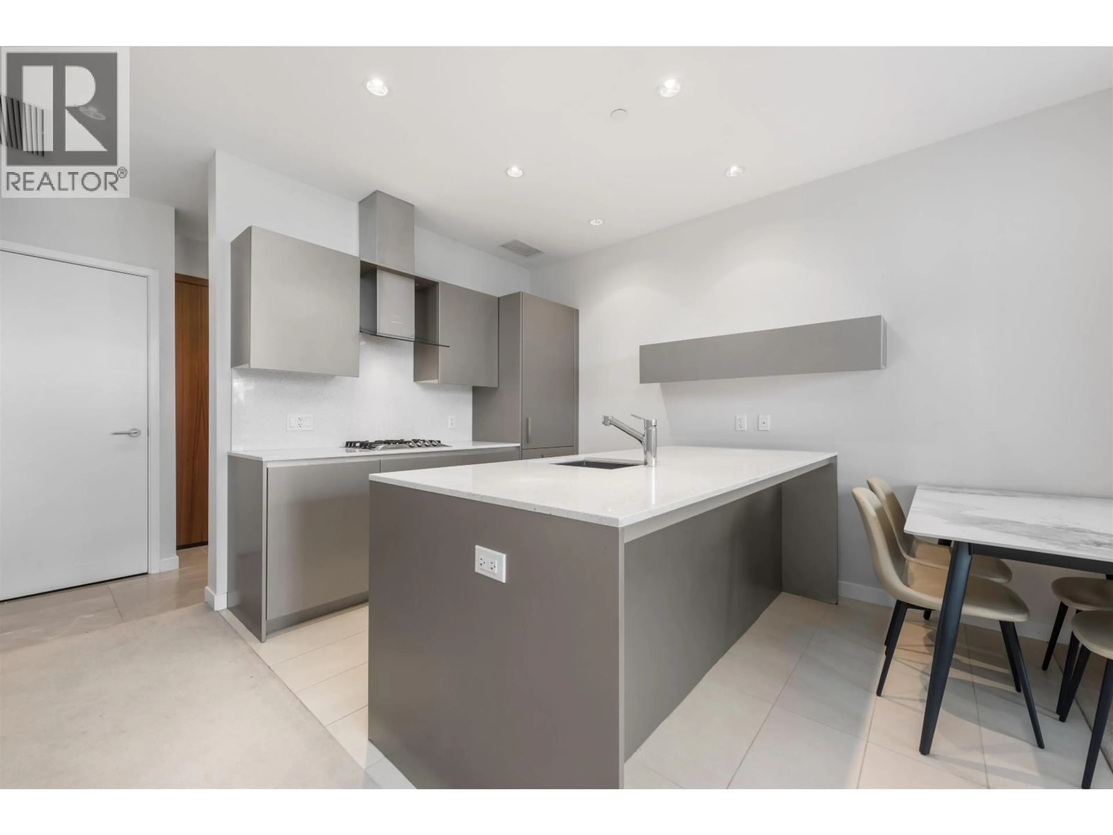 Contemporary kitchen, unknown for 203 - 5111 BRIGHOUSE WAY, Richmond British Columbia V7C0A6