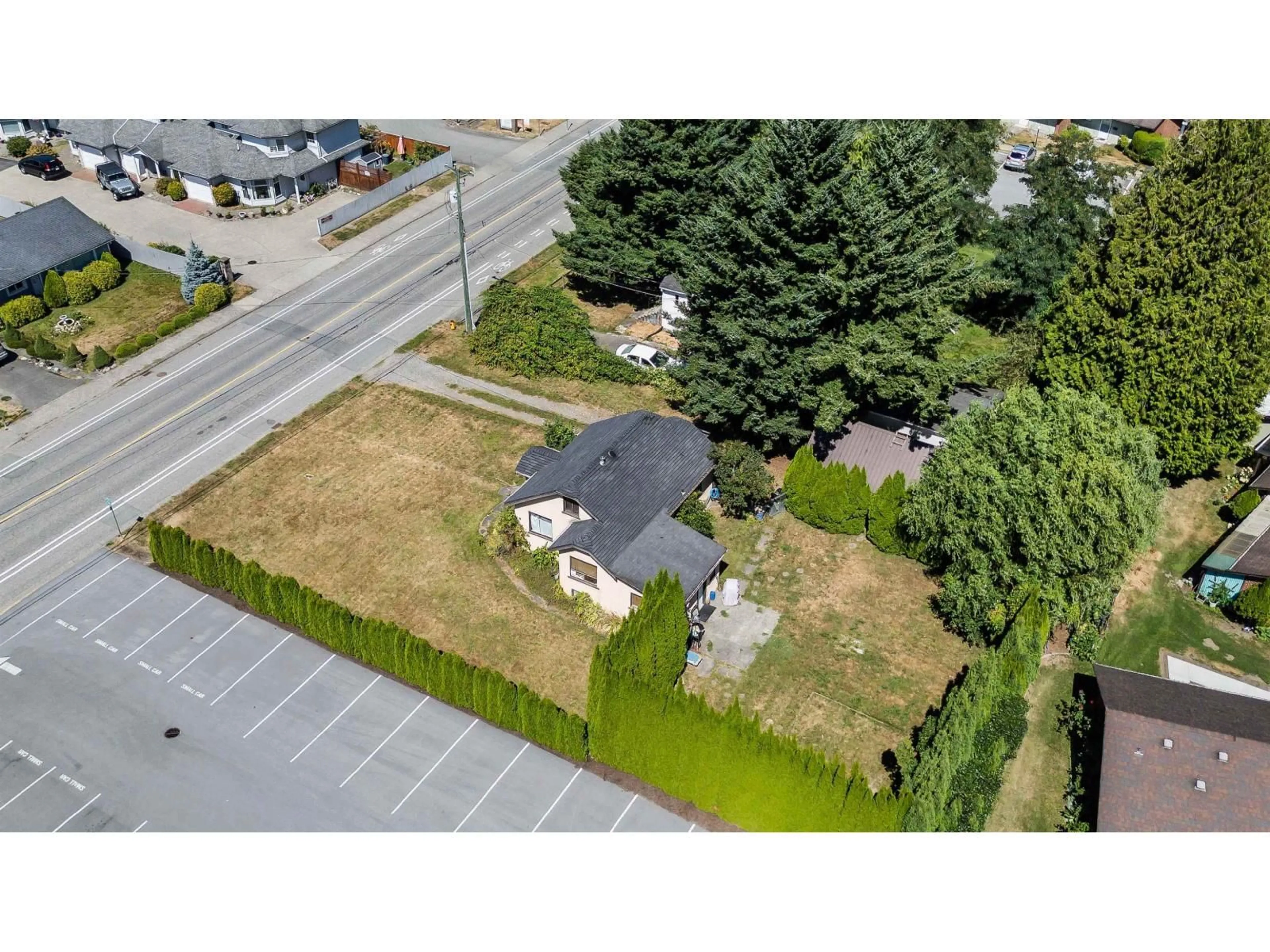 A pic from outside/outdoor area/front of a property/back of a property/a pic from drone, street for 9438 BROADWAY STREET, Chilliwack British Columbia V2P5T9
