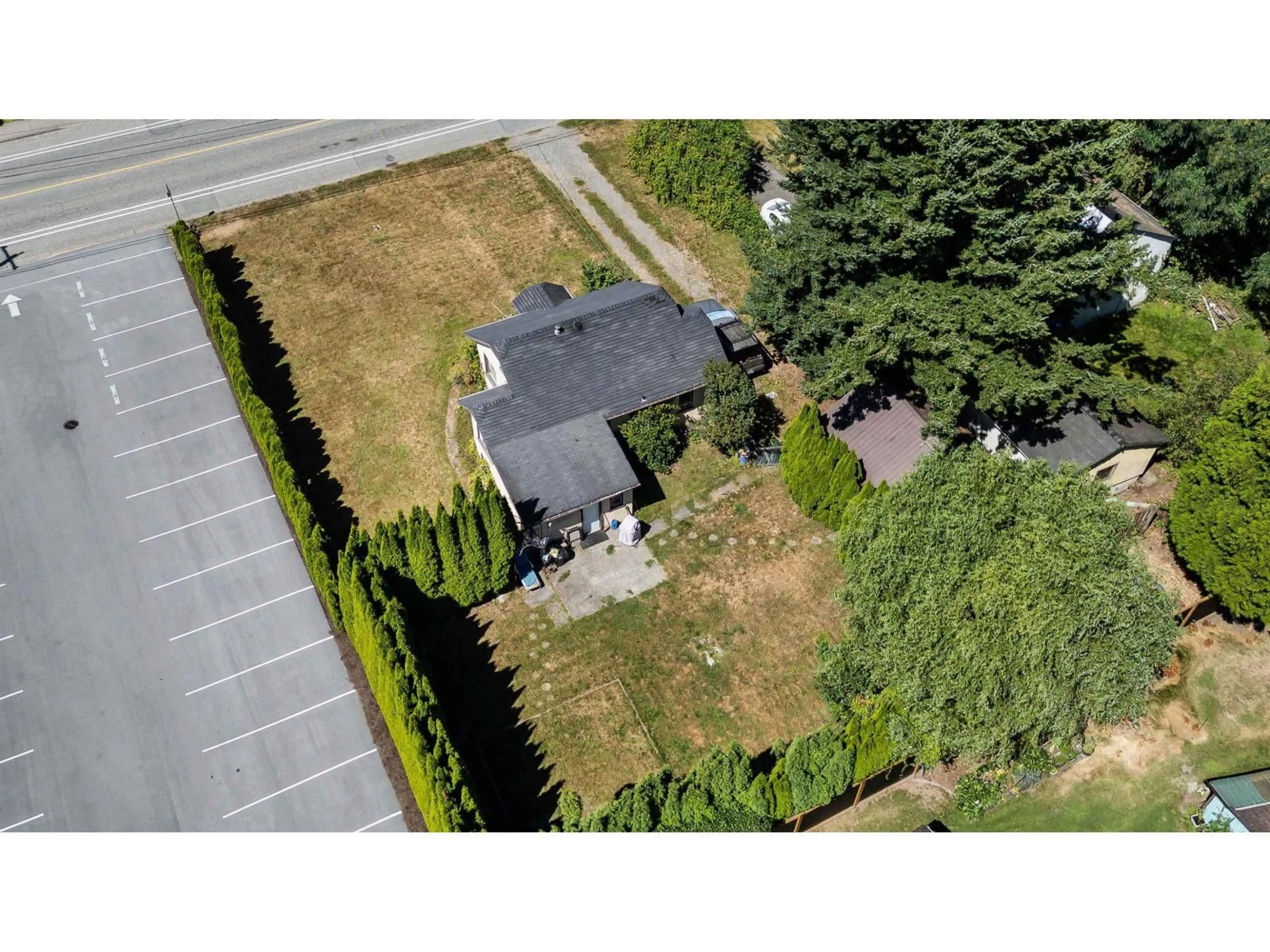 A pic from outside/outdoor area/front of a property/back of a property/a pic from drone, street for 9438 BROADWAY STREET, Chilliwack British Columbia V2P5T9