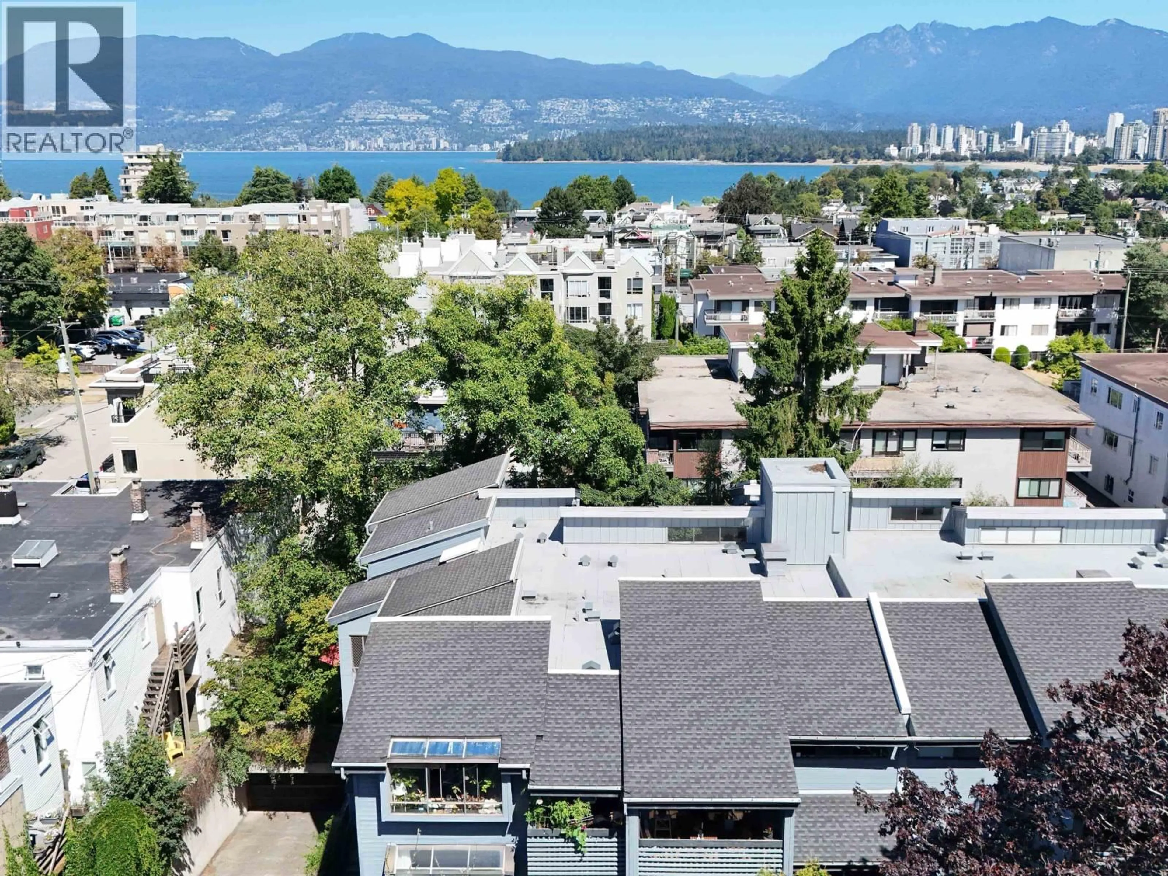 A pic from outside/outdoor area/front of a property/back of a property/a pic from drone, water/lake/river/ocean view for 208 - 2173 6TH AVENUE, Vancouver British Columbia V6K1V5