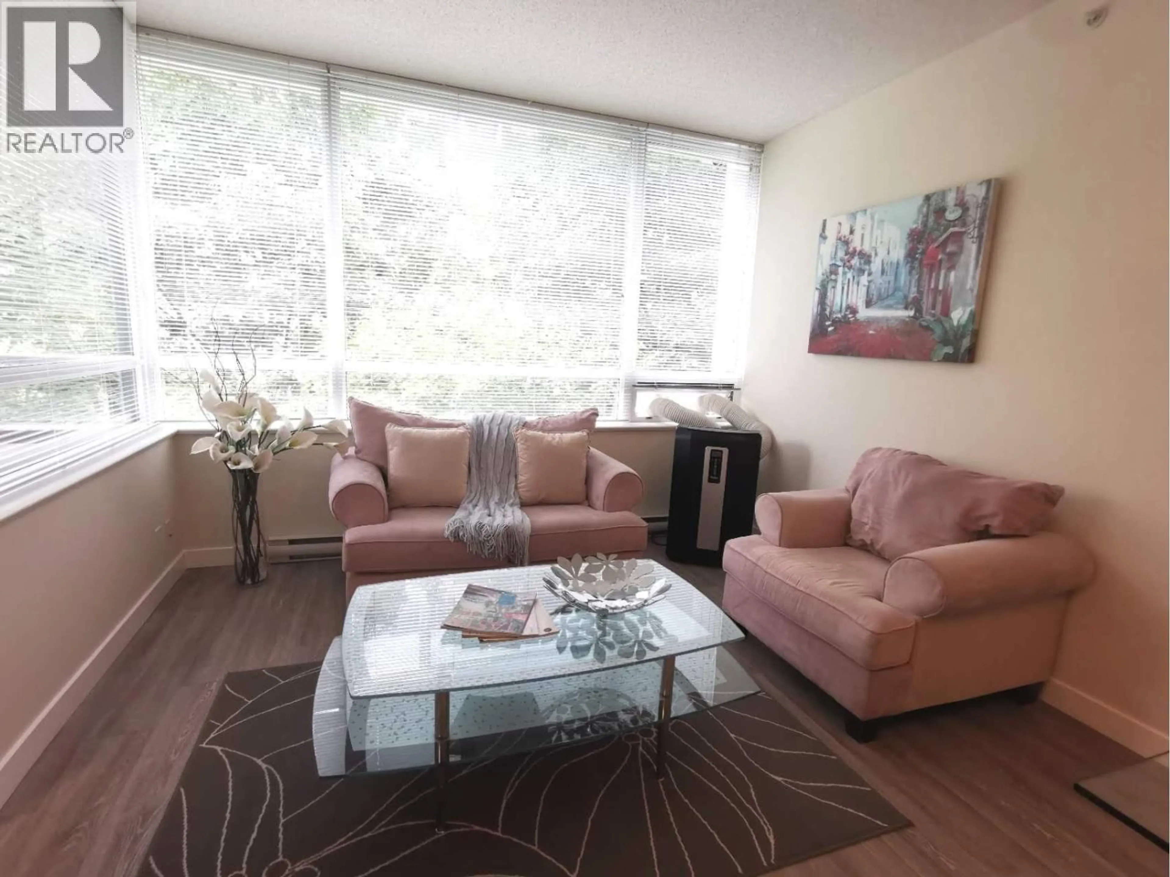 Living room with furniture, wood/laminate floor for 303 - 7555 ALDERBRIDGE WAY, Richmond British Columbia V6X4L3
