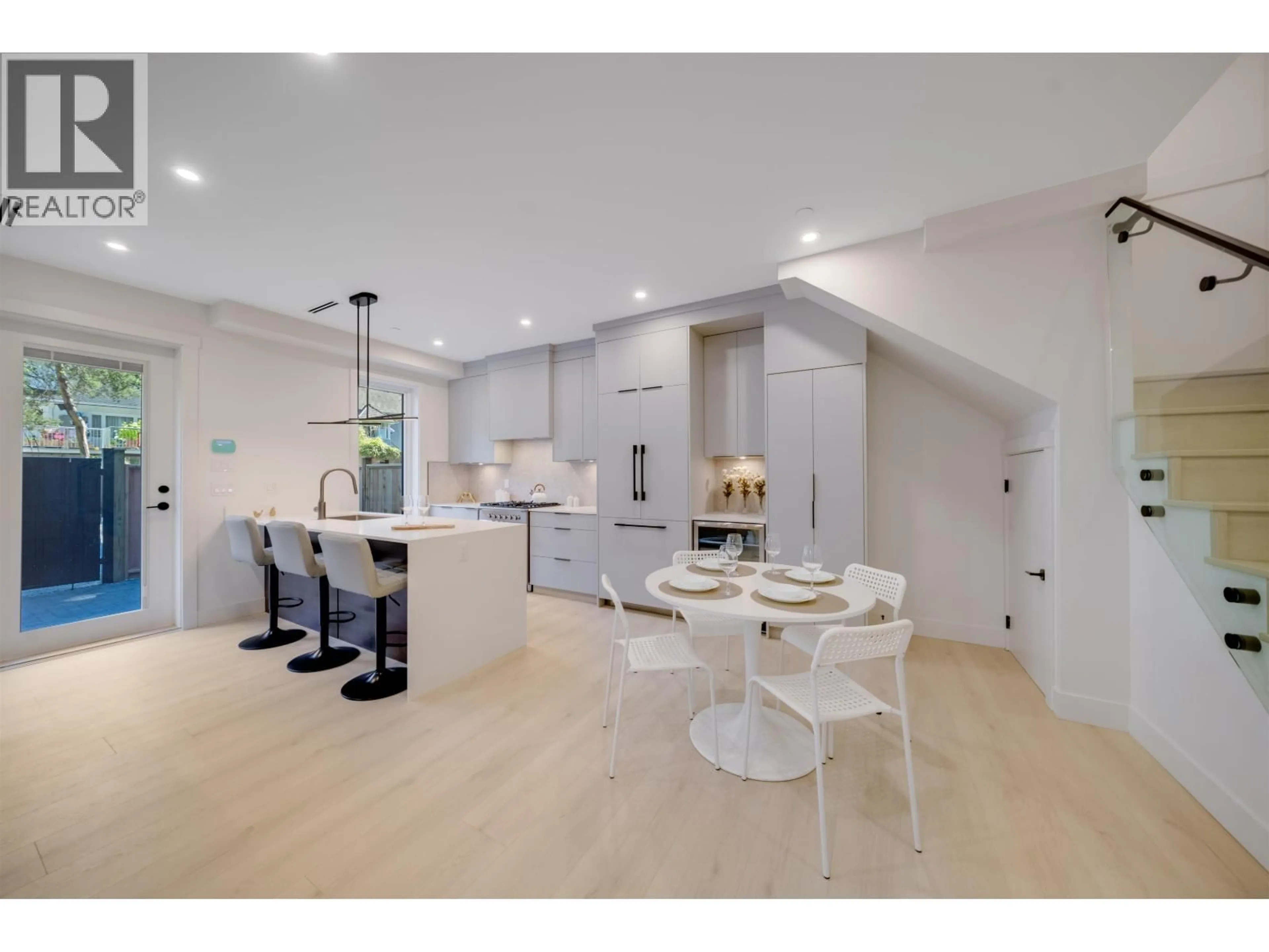Open concept kitchen, ceramic/tile floor for 3 - 3836 8TH AVENUE, Vancouver British Columbia V6R1Z4