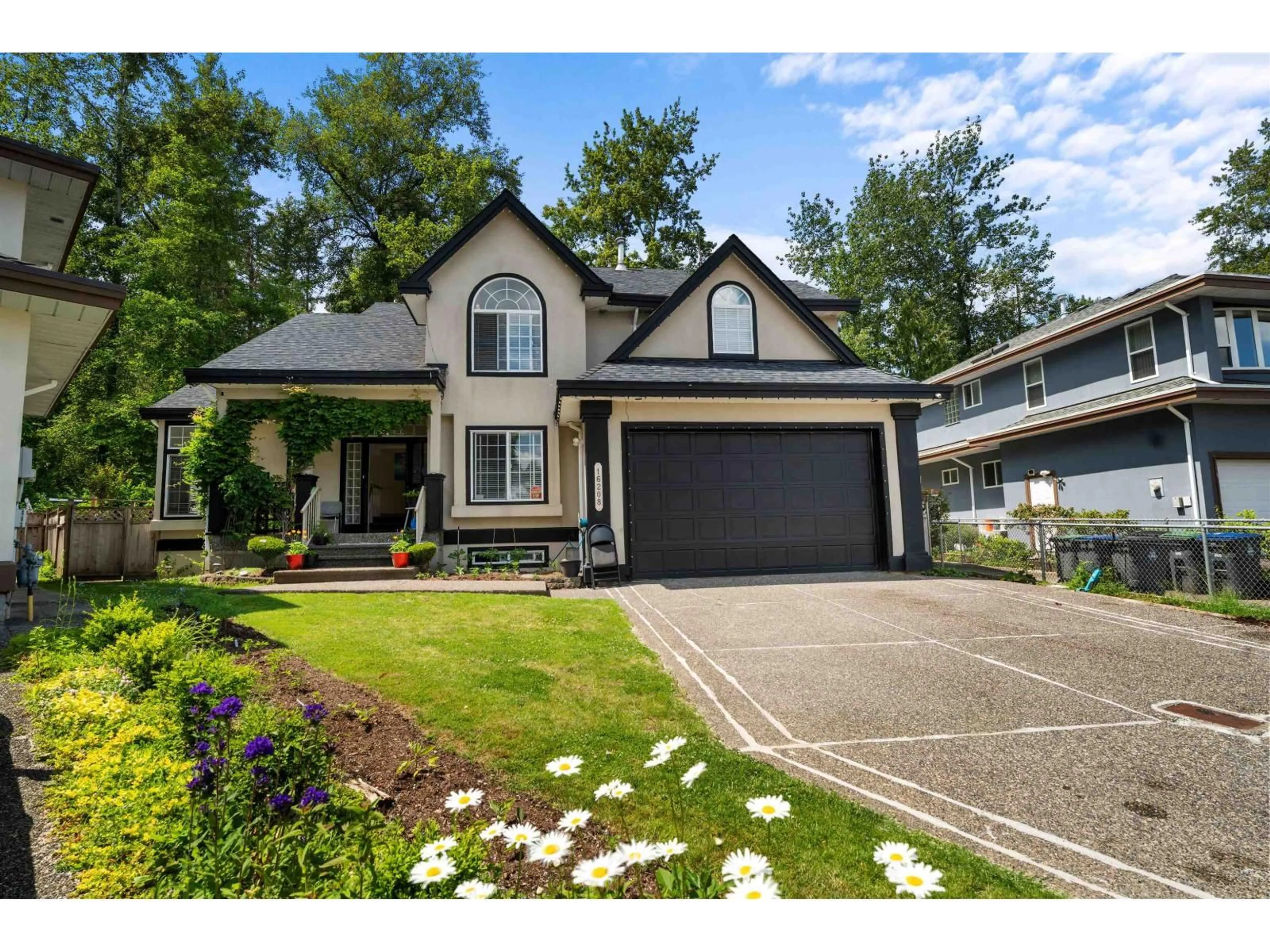 Home with vinyl exterior material, street for 16208 93A, Surrey British Columbia V4N4Z9