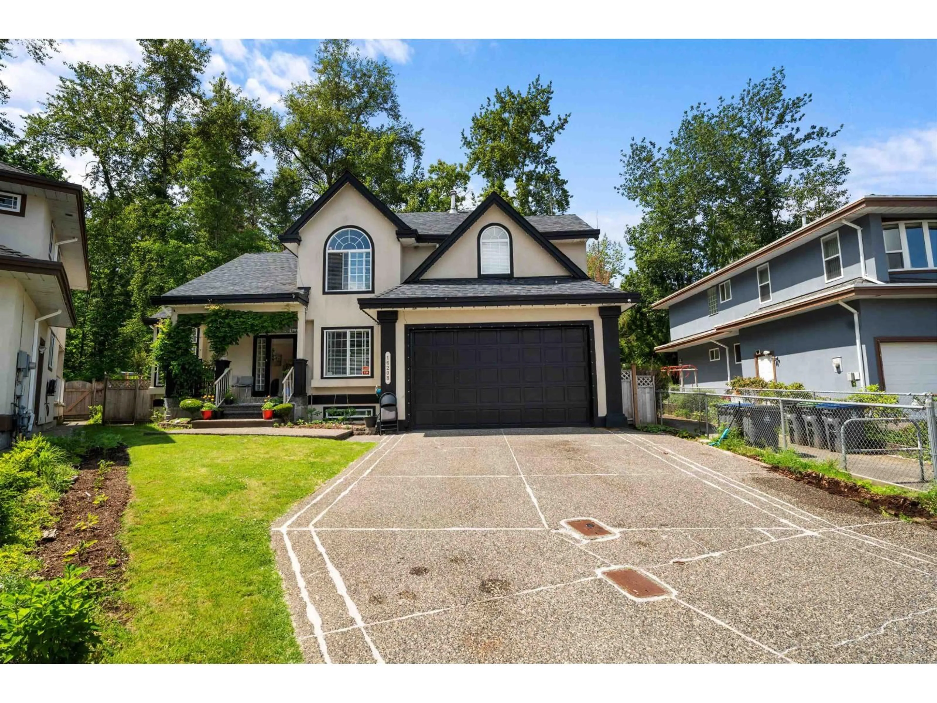 Home with vinyl exterior material, street for 16208 93A, Surrey British Columbia V4N4Z9