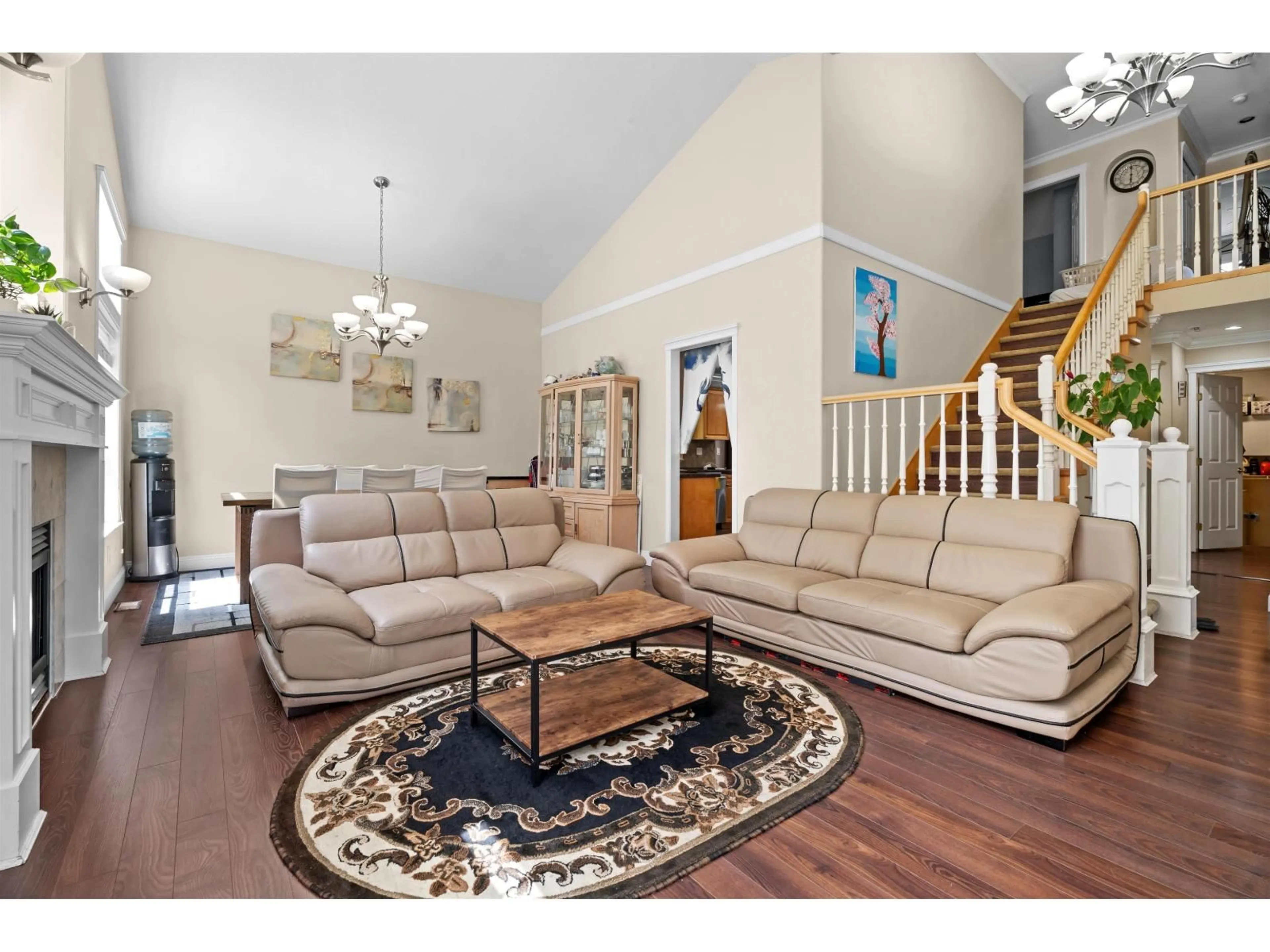 Living room with furniture, wood/laminate floor for 16208 93A, Surrey British Columbia V4N4Z9