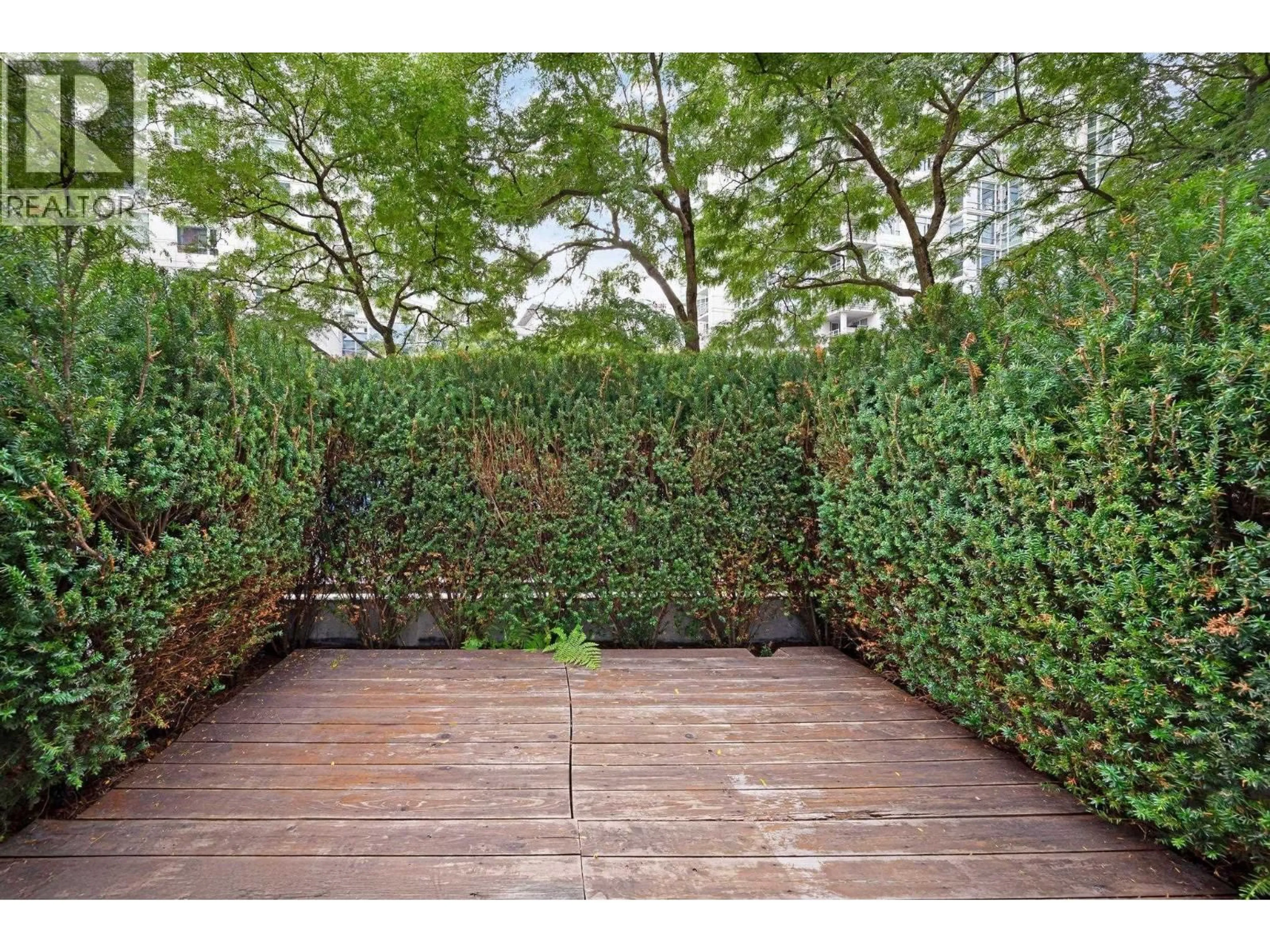 Patio, forest/trees view for 133 AQUARIUS MEWS, Vancouver British Columbia V6Z2Z1