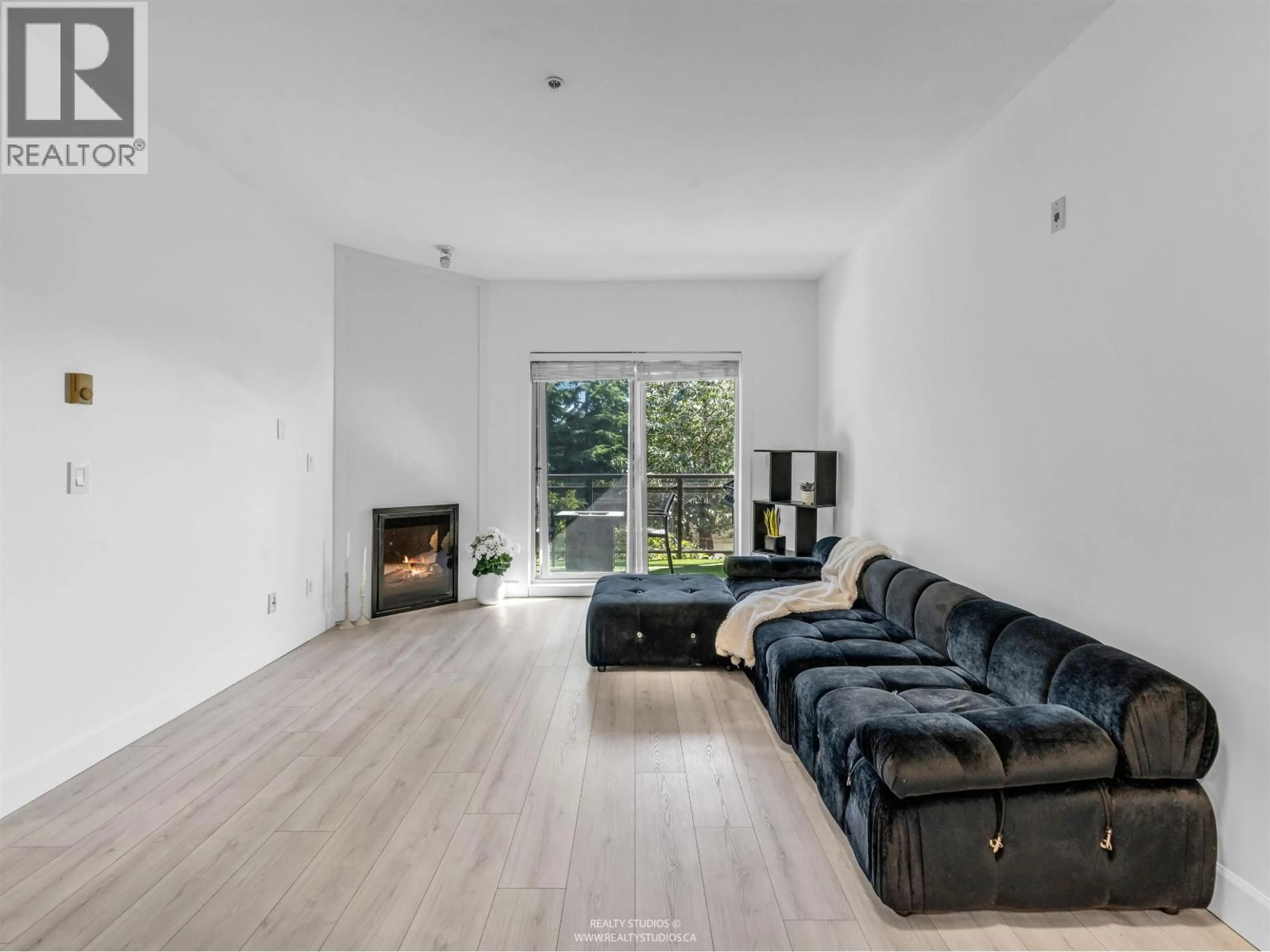 Living room with furniture, unknown for 208 - 1988 SUFFOLK AVENUE, Port Coquitlam British Columbia V3B1H2