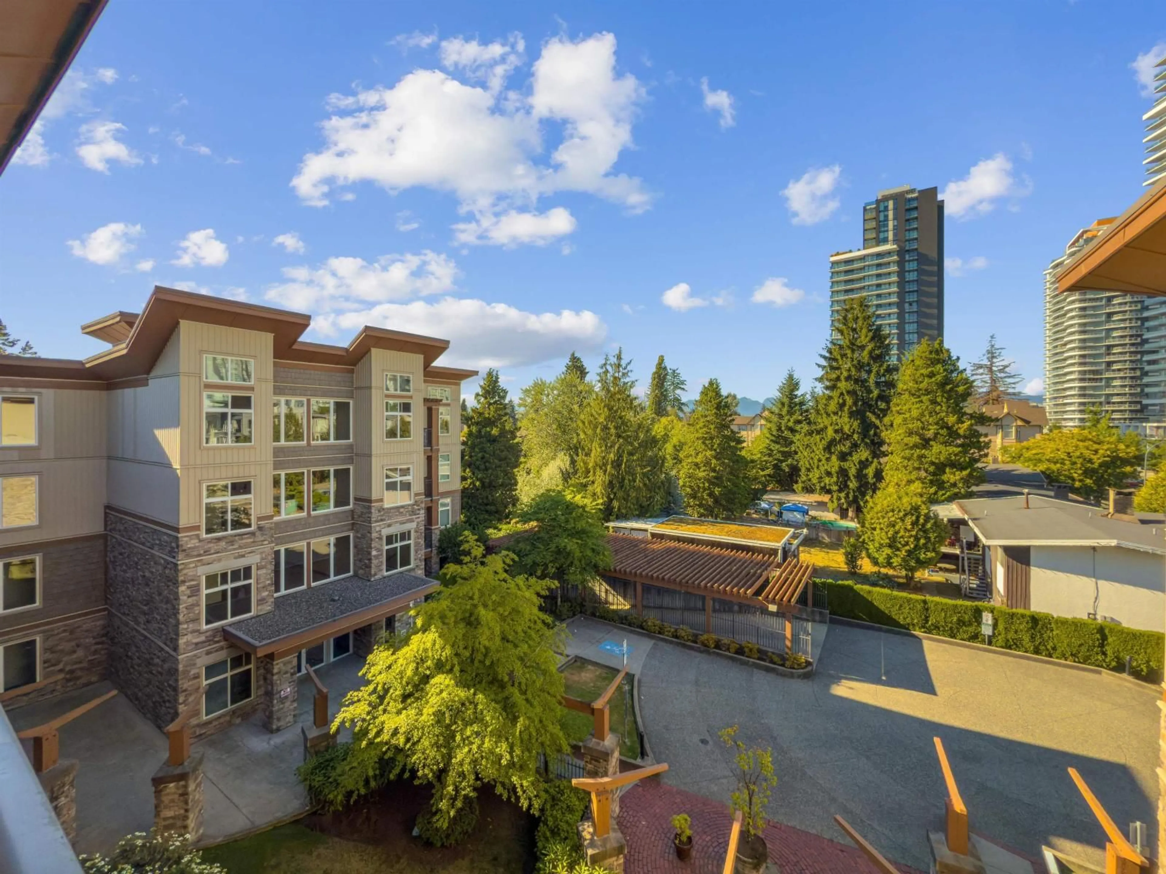 A pic from outside/outdoor area/front of a property/back of a property/a pic from drone, city buildings view from balcony for 415 - 10237 133, Surrey British Columbia V3T0C6