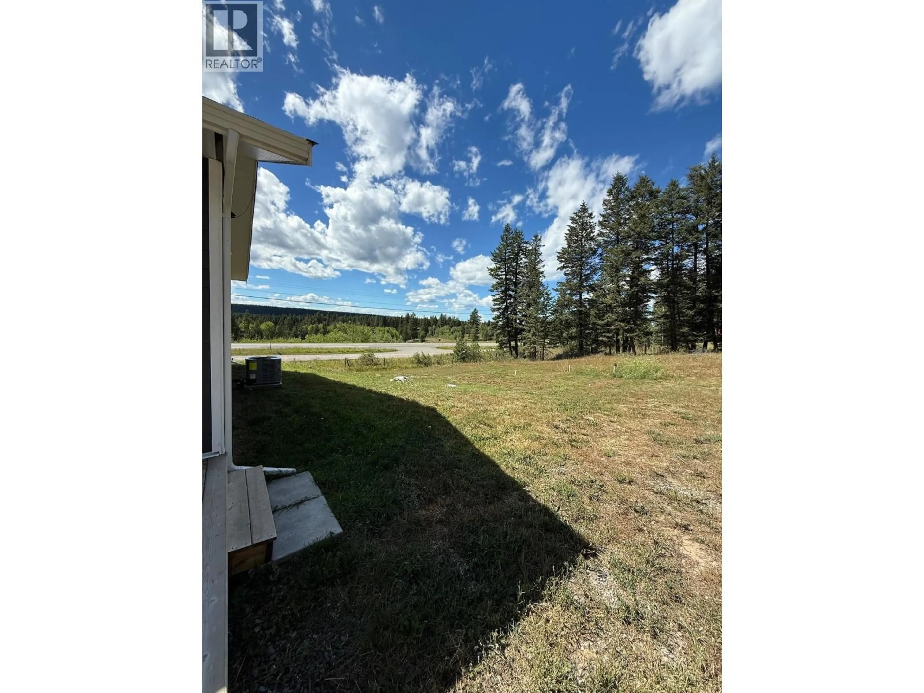 A pic from outside/outdoor area/front of a property/back of a property/a pic from drone, water/lake/river/ocean view for 3791 DODGE ROAD, Lac La Hache British Columbia V0K1T1