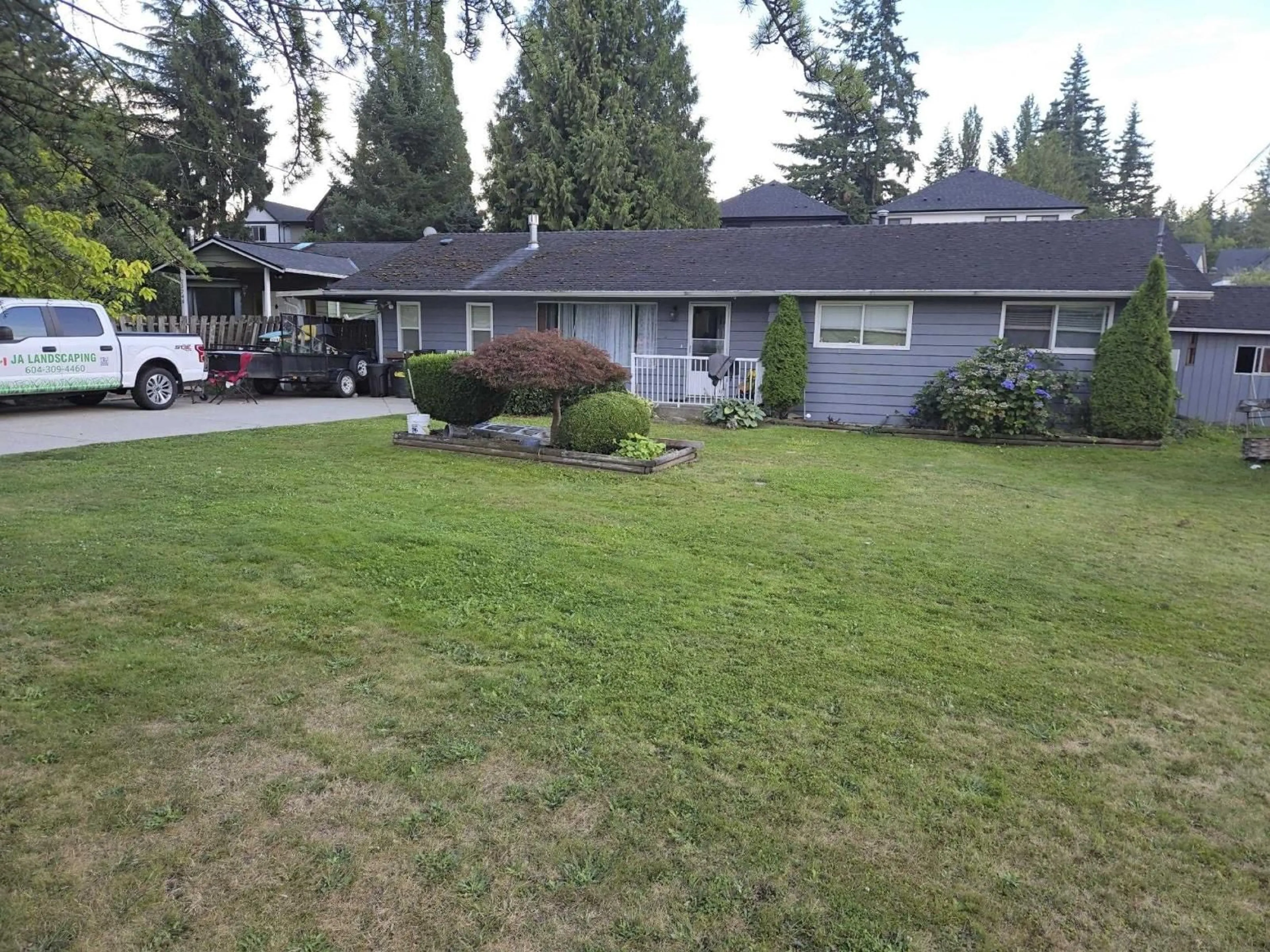 A pic from outside/outdoor area/front of a property/back of a property/a pic from drone, mountain view for 23740 FRASER, Langley British Columbia V2Z2K8