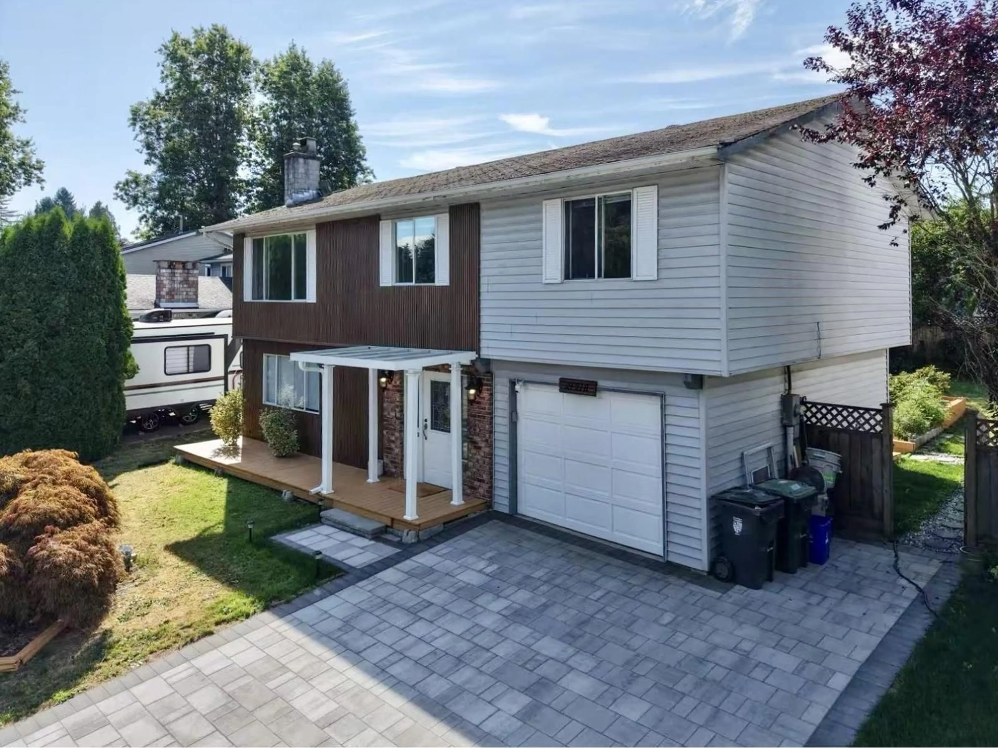 Home with vinyl exterior material, street for 21218 93, Langley British Columbia V1M1K3
