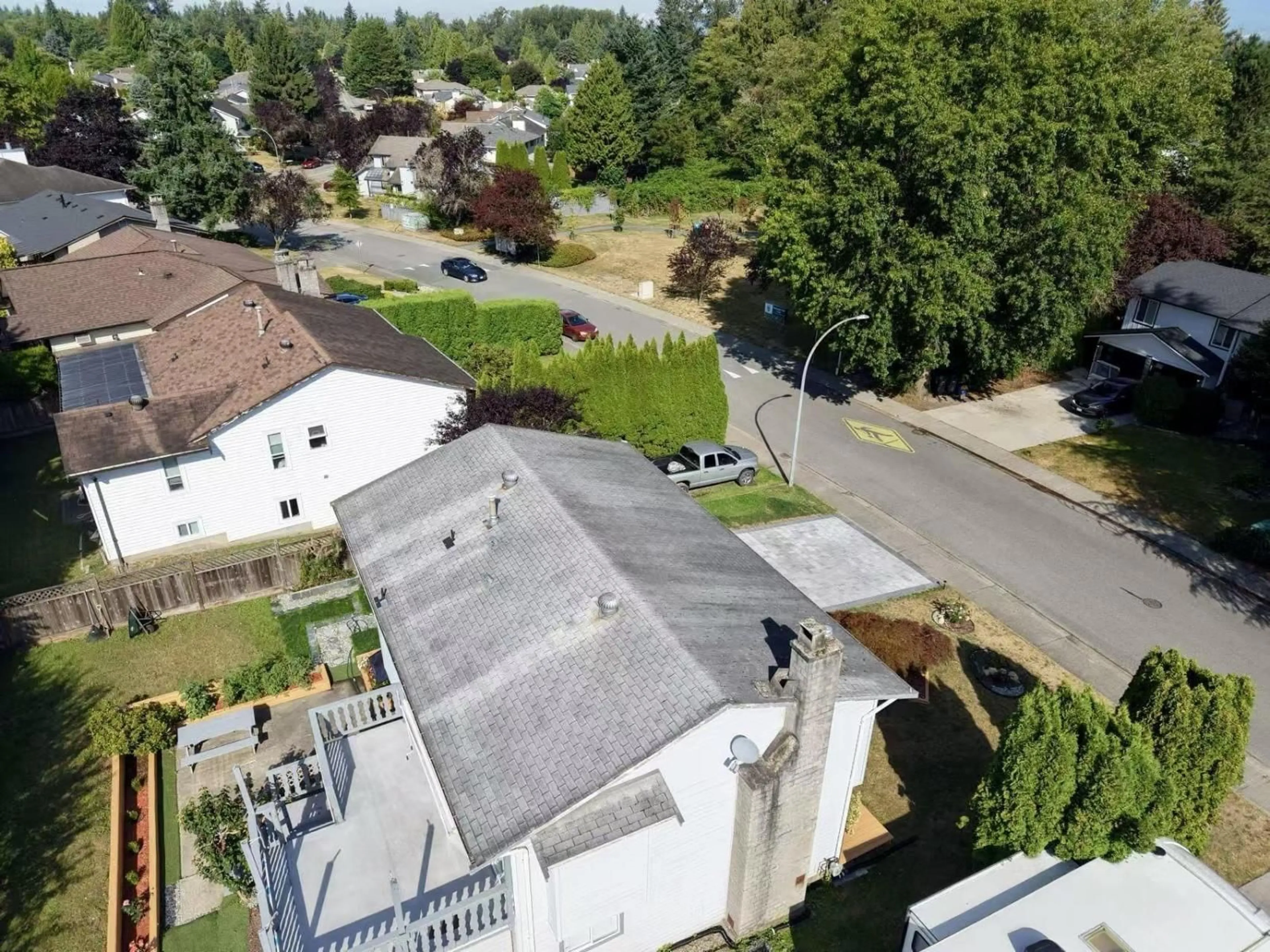 A pic from outside/outdoor area/front of a property/back of a property/a pic from drone, street for 21218 93, Langley British Columbia V1M1K3
