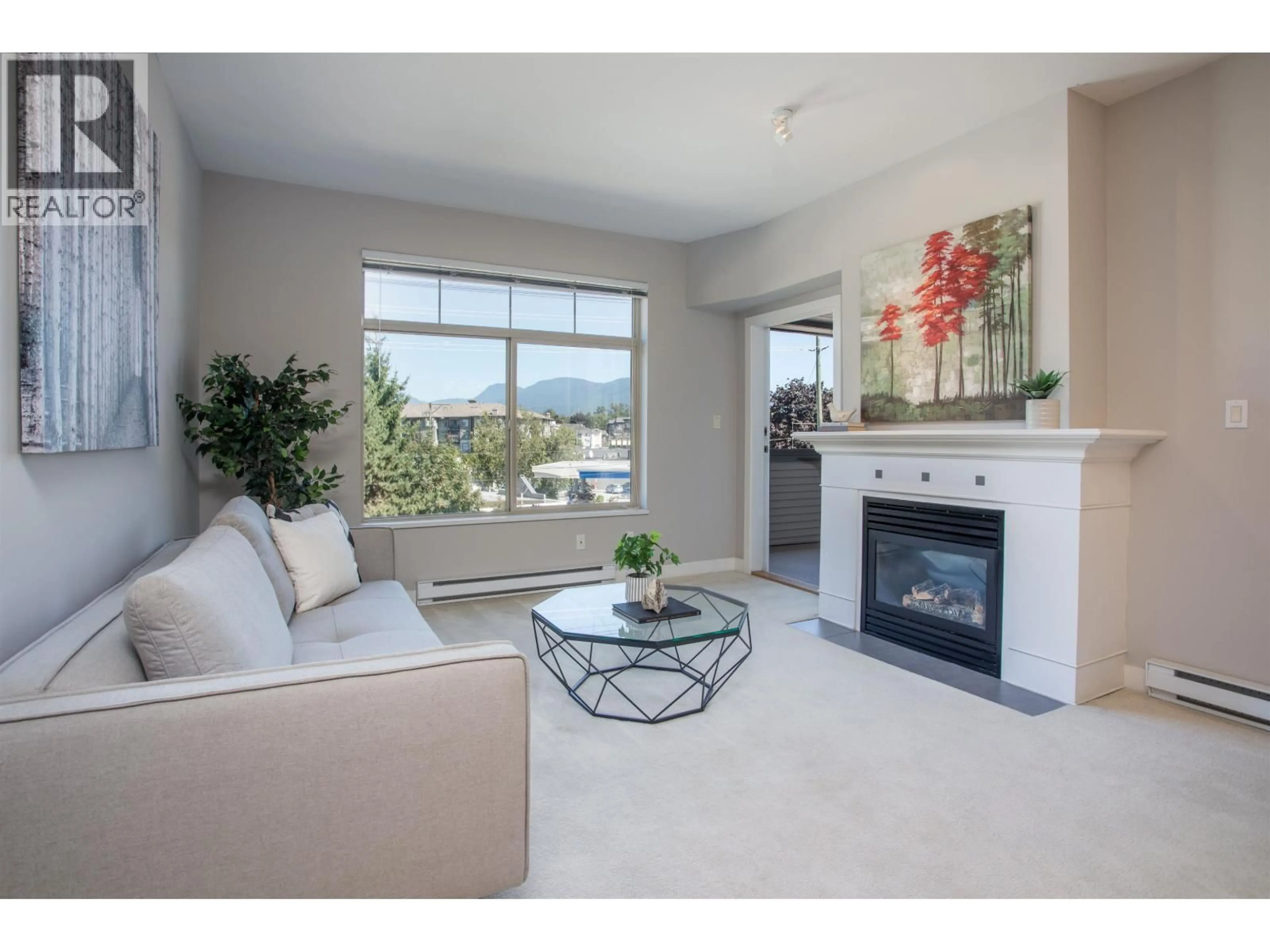 Living room with furniture, unknown for 302 - 2330 WILSON AVENUE, Port Coquitlam British Columbia V3C1Z6