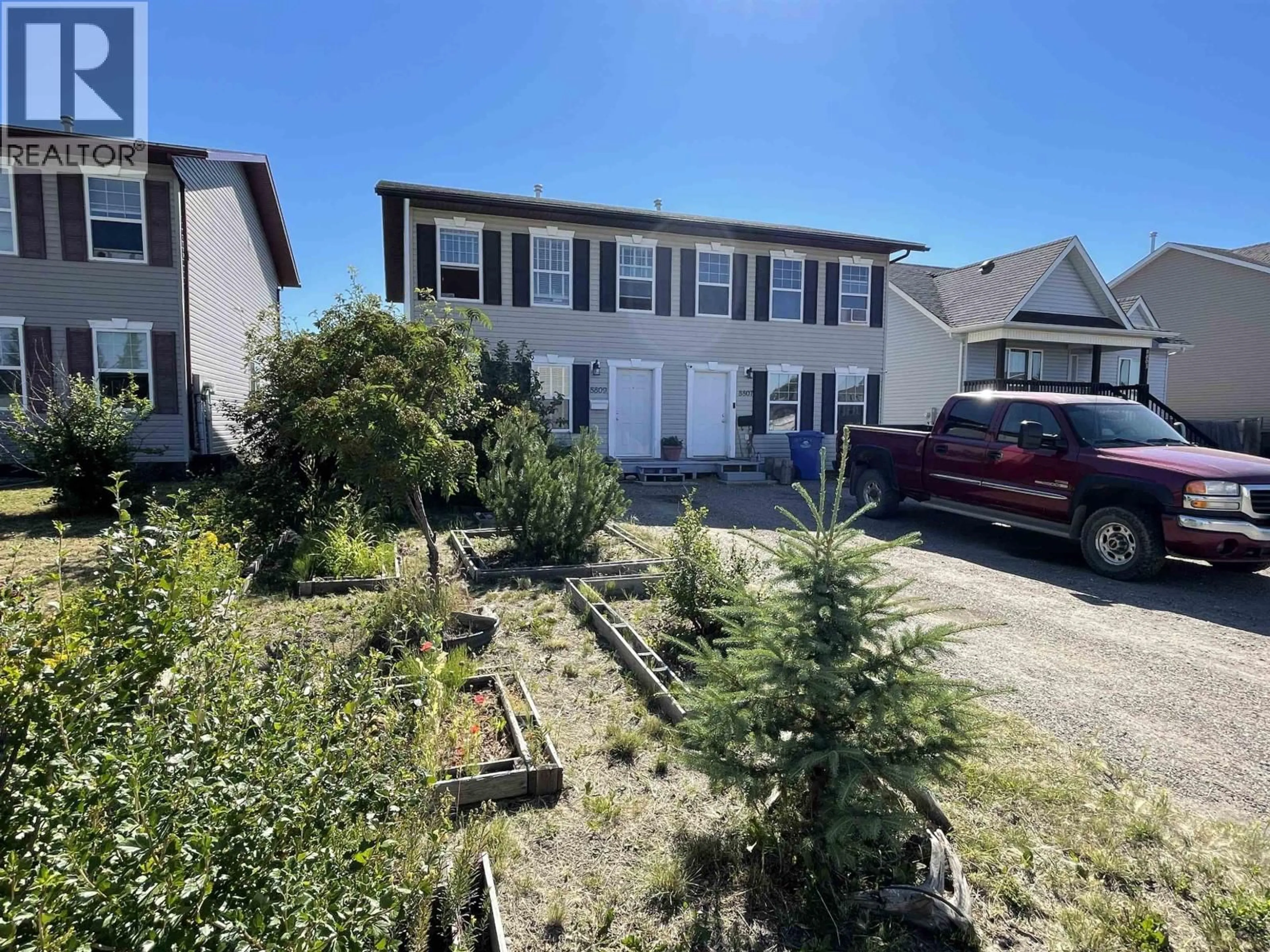 A pic from outside/outdoor area/front of a property/back of a property/a pic from drone, street for 8809 79A STREET, Fort St. John British Columbia V1J6W8