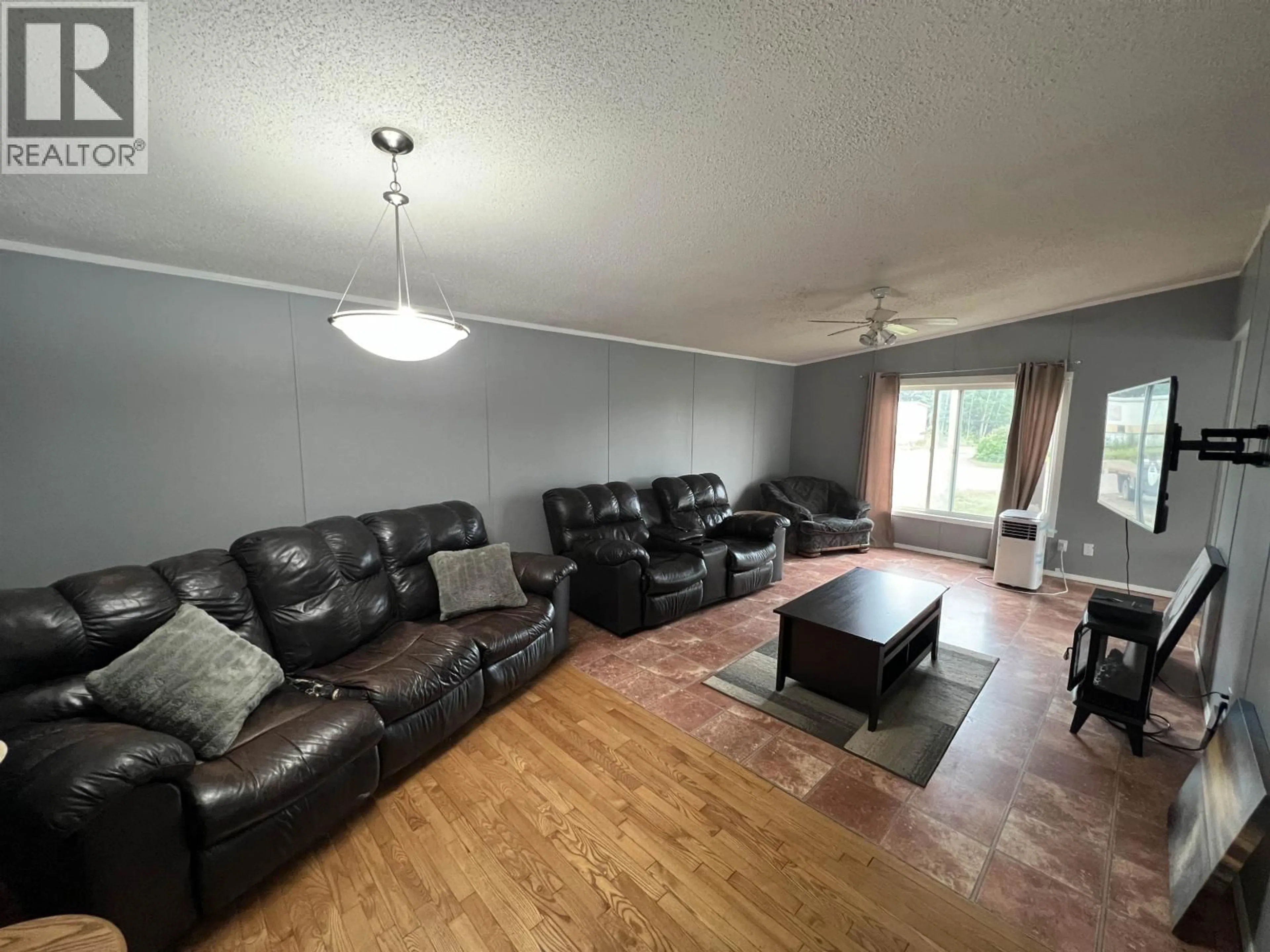 Living room with furniture, unknown for 5207 COTTONWOOD ROAD, Fort Nelson British Columbia V0C1R0