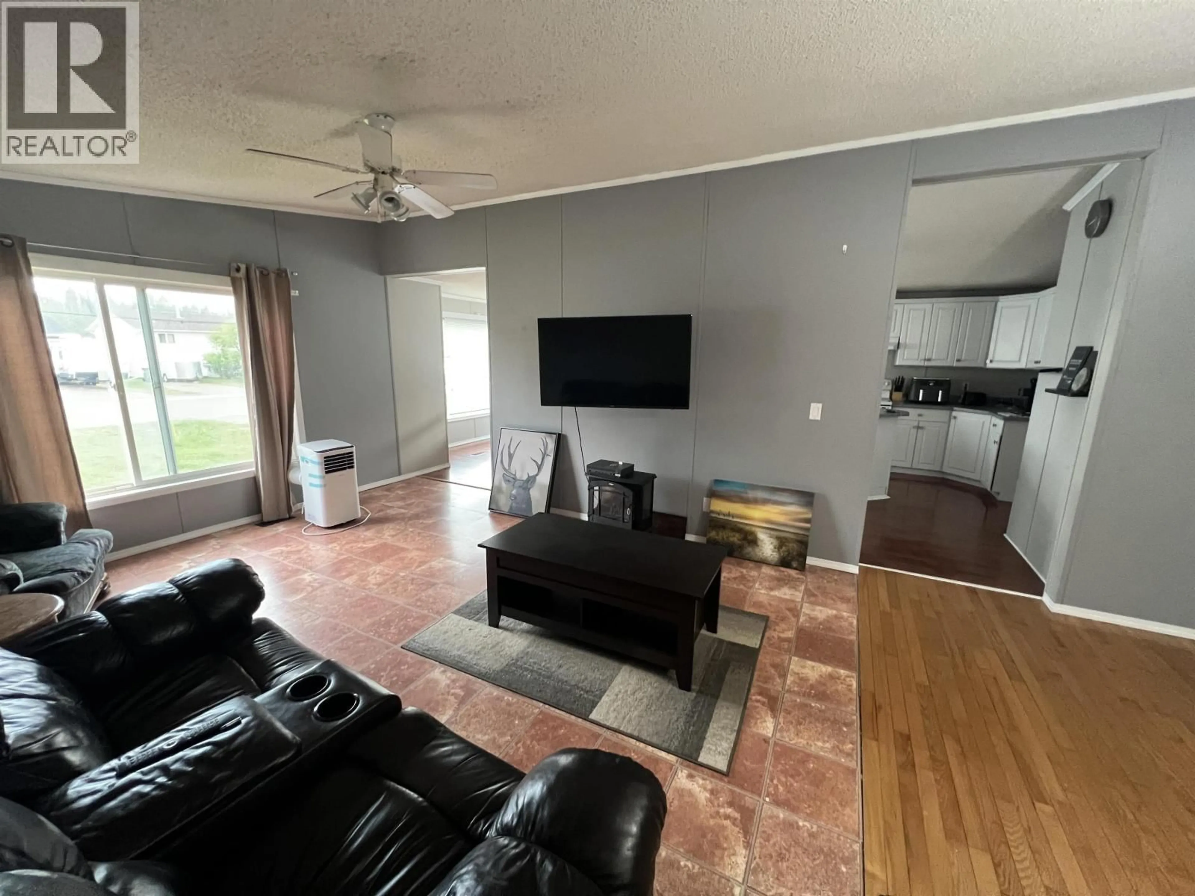 Living room with furniture, unknown for 5207 COTTONWOOD ROAD, Fort Nelson British Columbia V0C1R0