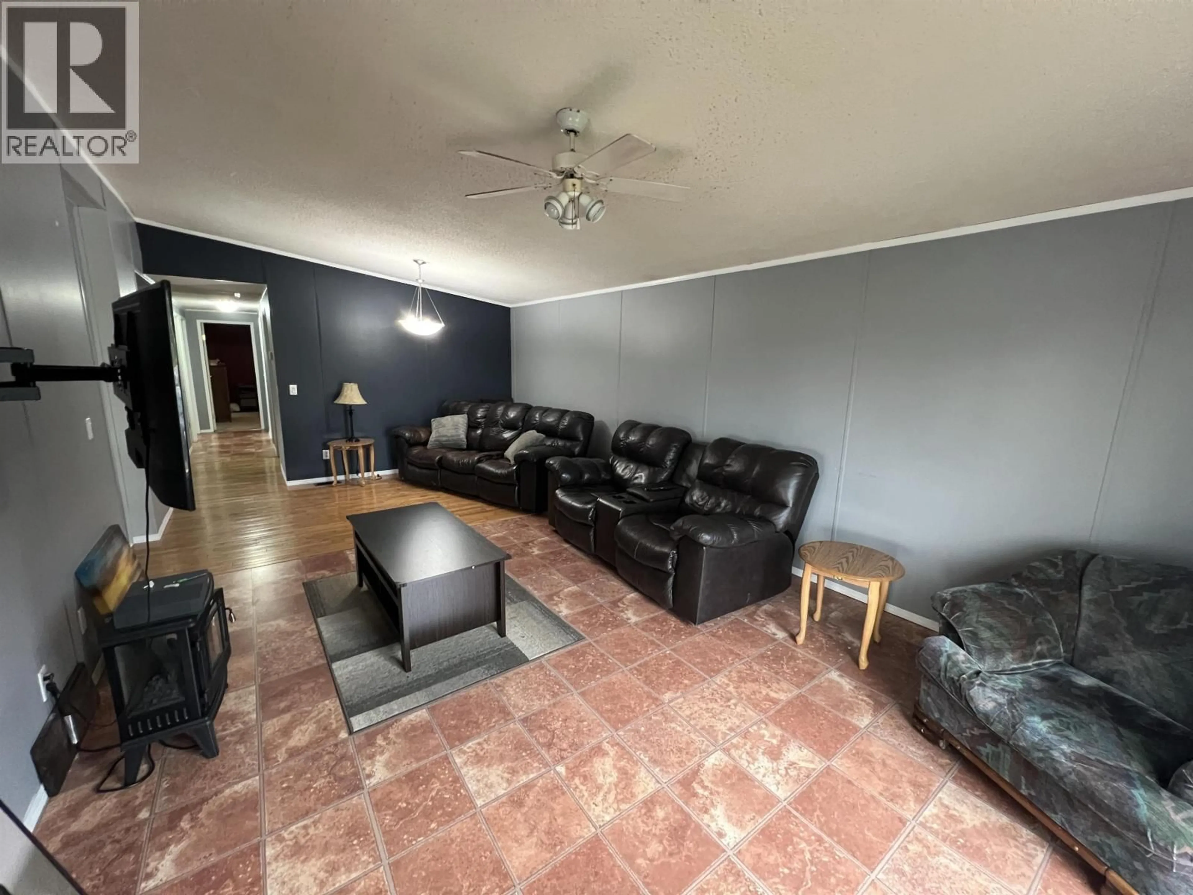Living room with furniture, unknown for 5207 COTTONWOOD ROAD, Fort Nelson British Columbia V0C1R0