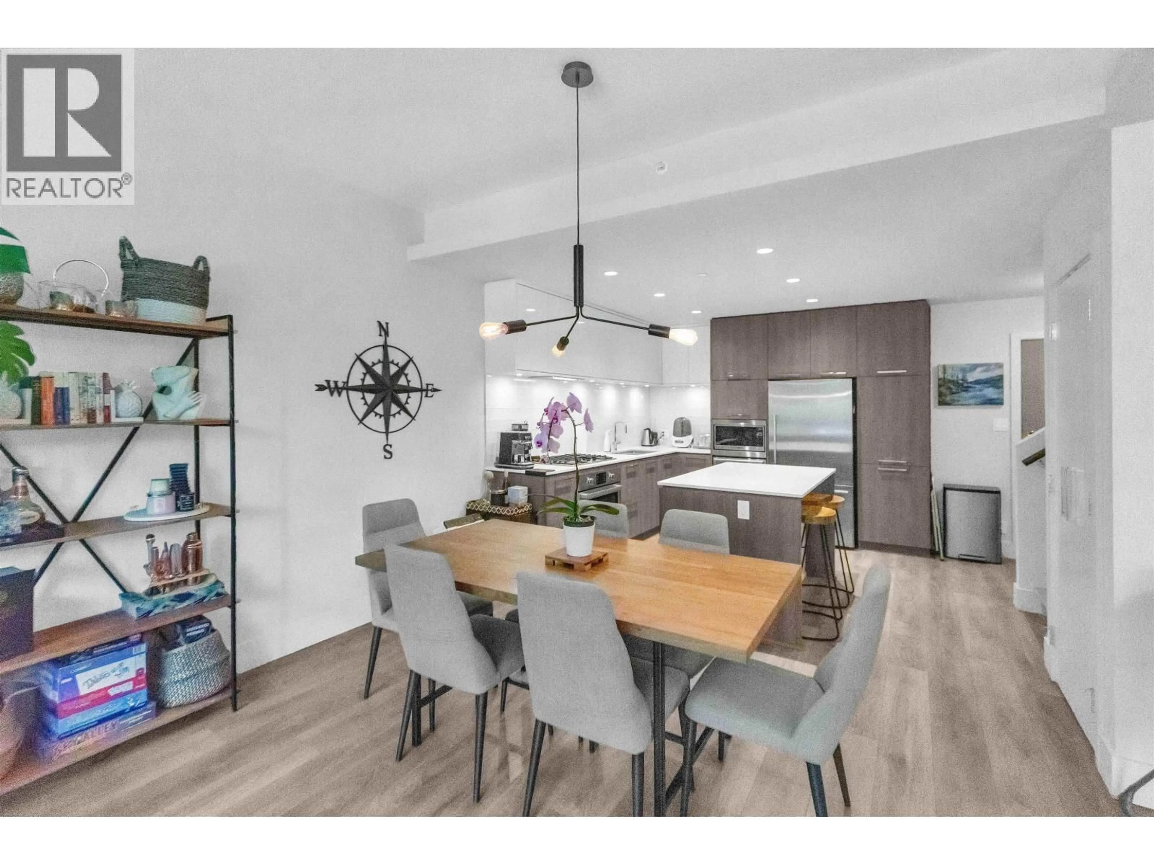 Open concept kitchen, wood/laminate floor for 104 - 680 SEYLYNN CRESCENT, North Vancouver British Columbia V7J0B5
