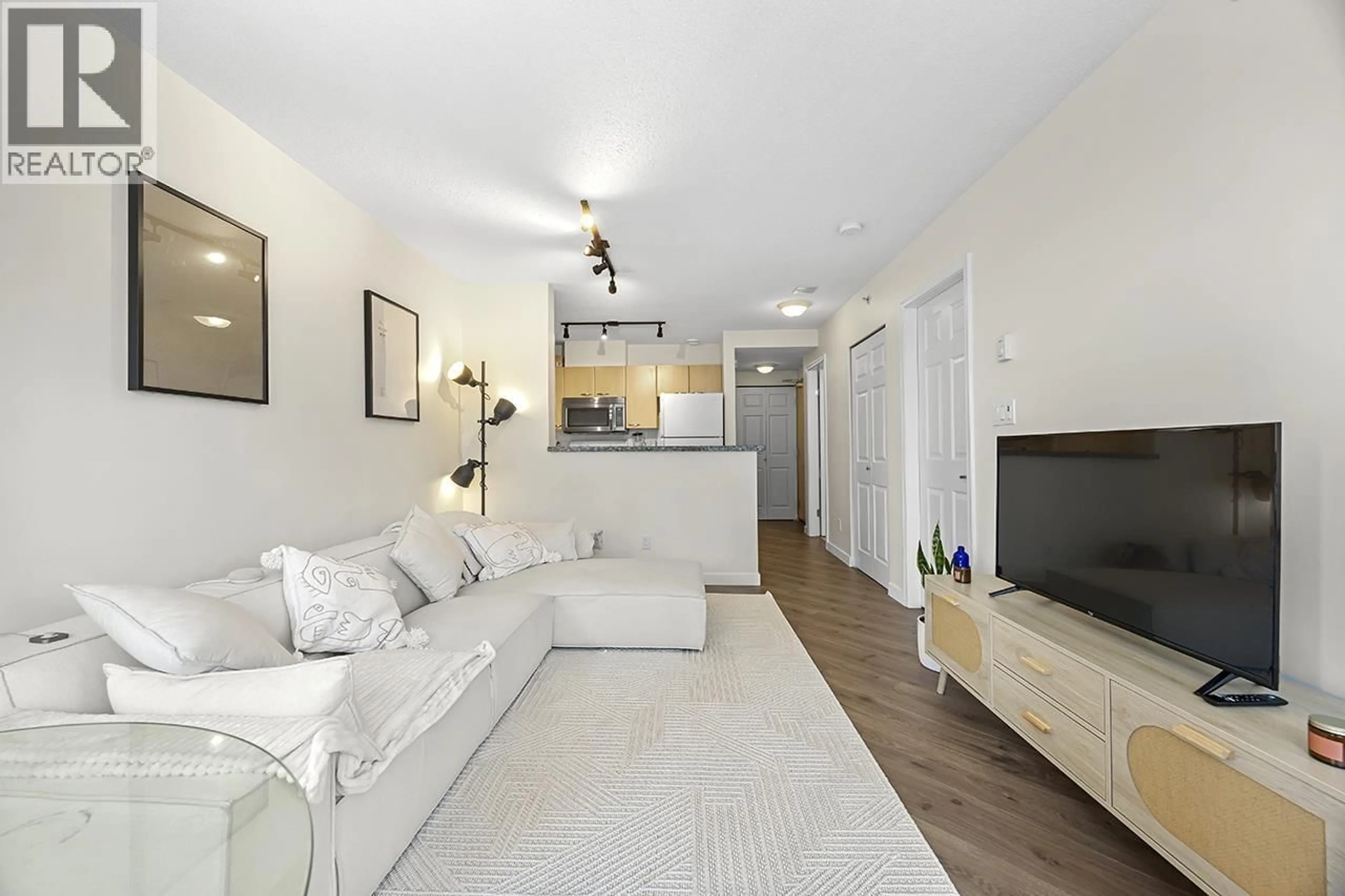 Living room with furniture, wood/laminate floor for 1601 - 1420 GEORGIA STREET, Vancouver British Columbia V6G3K4
