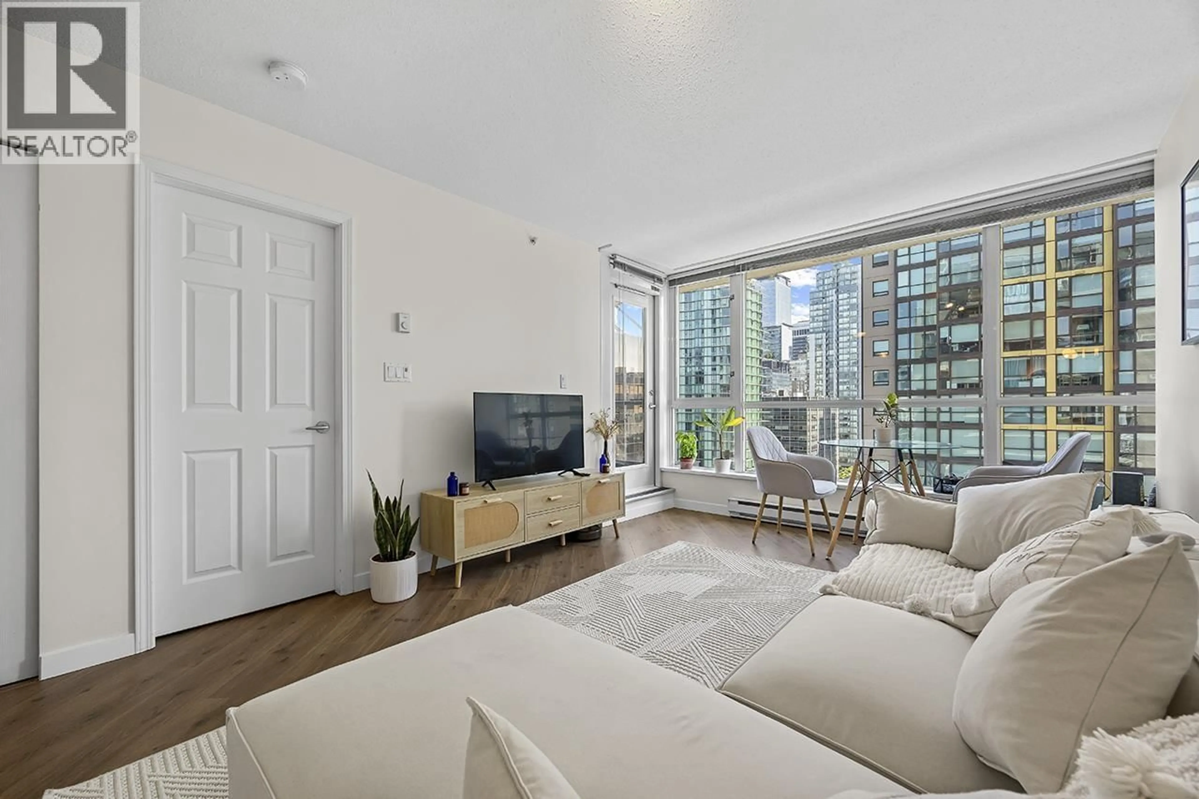 Living room with furniture, floor is not visible for 1601 - 1420 GEORGIA STREET, Vancouver British Columbia V6G3K4