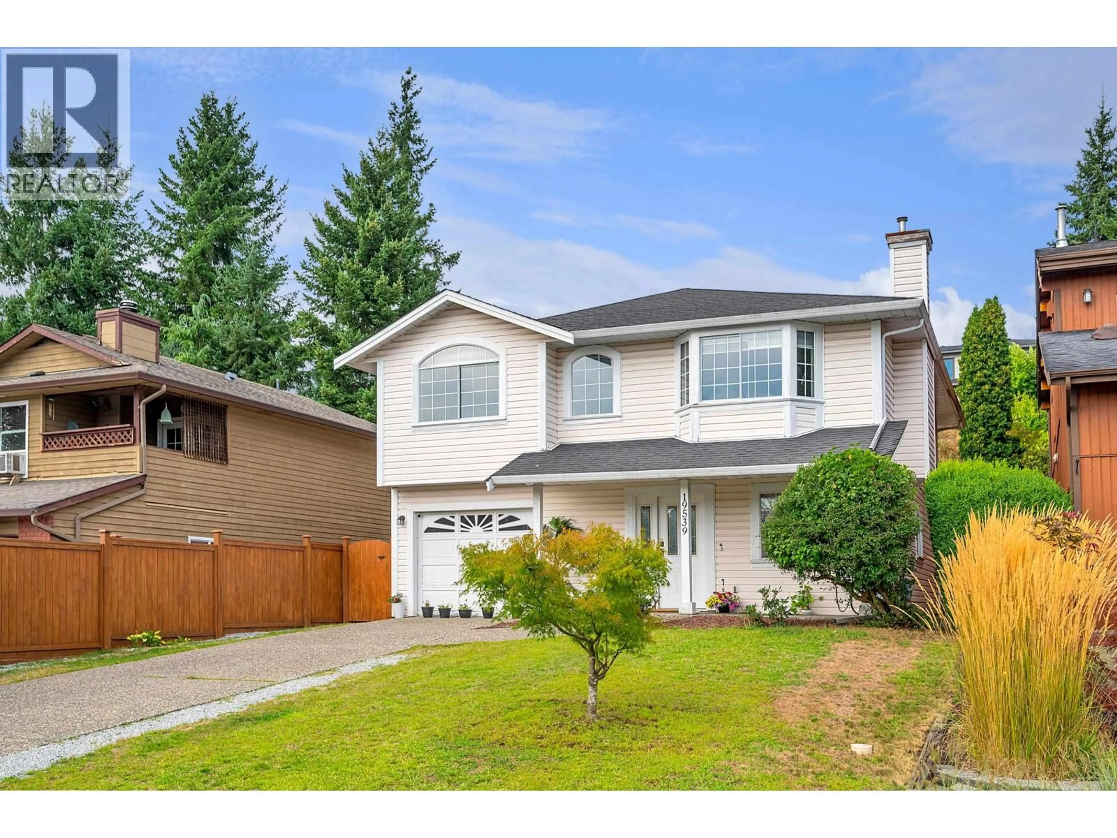 Home with vinyl exterior material, street for 19539 115A AVENUE, Pitt Meadows British Columbia V3Y1R2