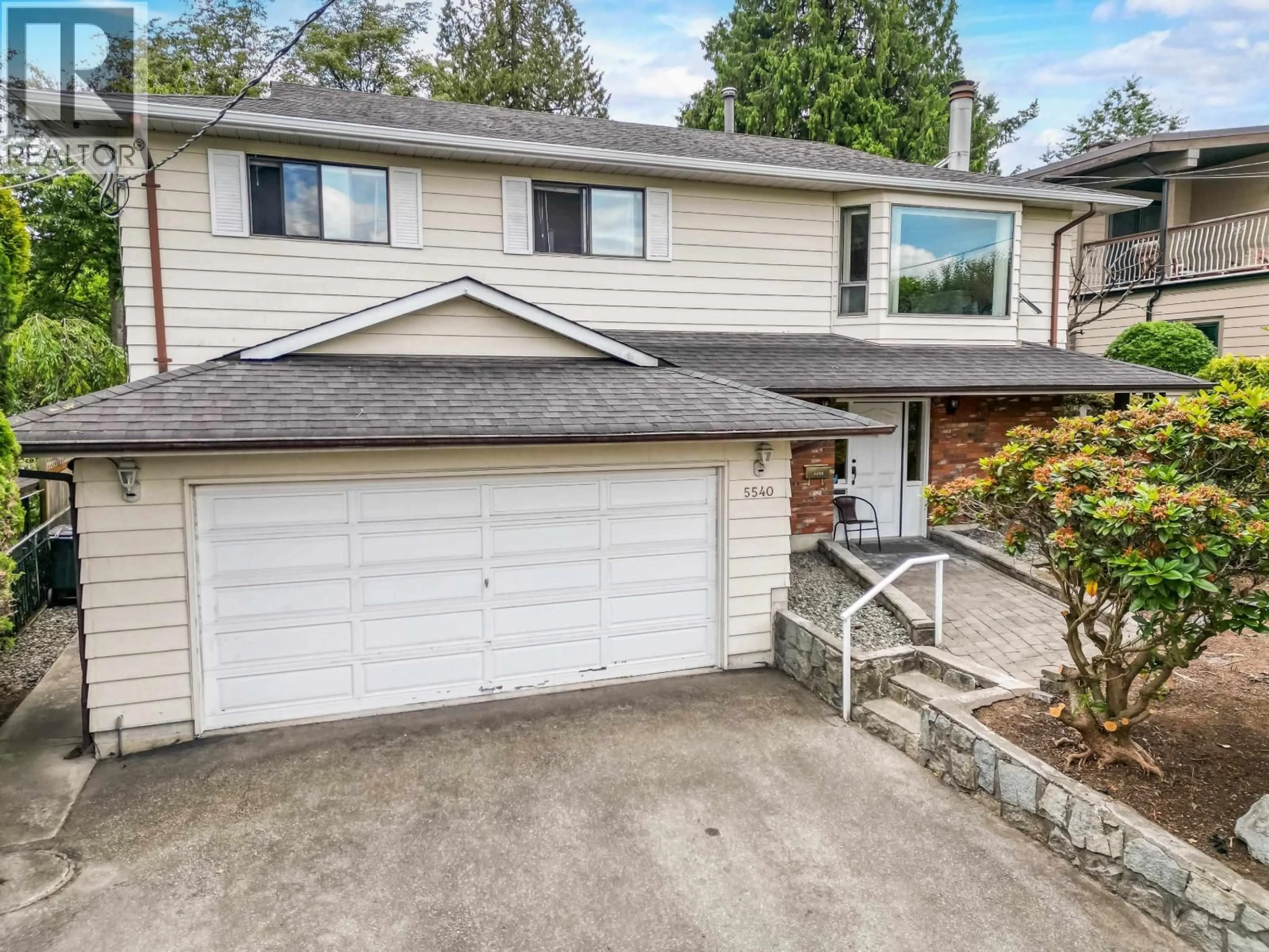 Home with vinyl exterior material, street for 5540 LAUREL STREET, Burnaby British Columbia V5G1N2
