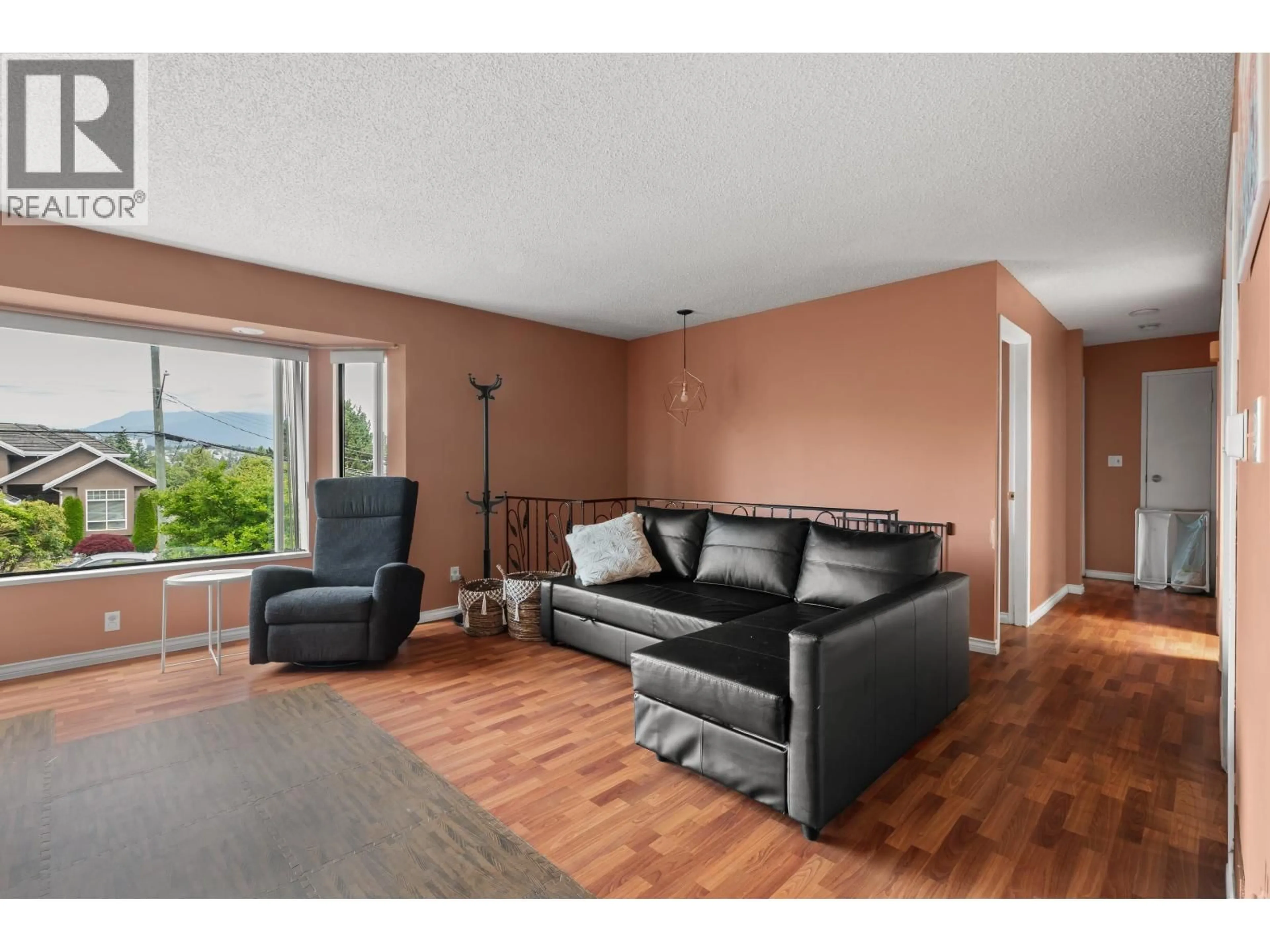 Living room with furniture, wood/laminate floor for 5540 LAUREL STREET, Burnaby British Columbia V5G1N2