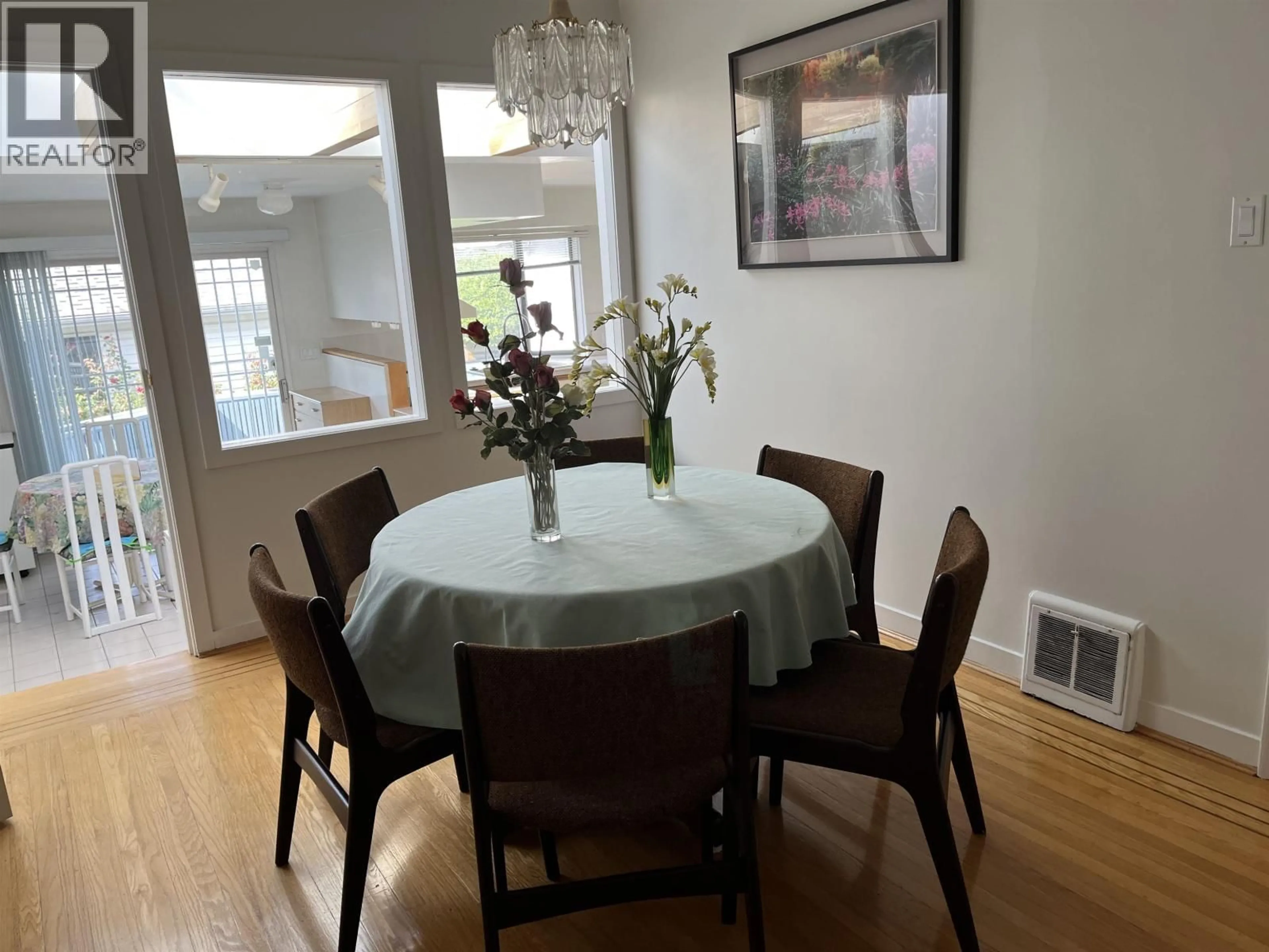 Dining room, wood/laminate floor for 2215 20TH AVENUE, Vancouver British Columbia V6L1G2
