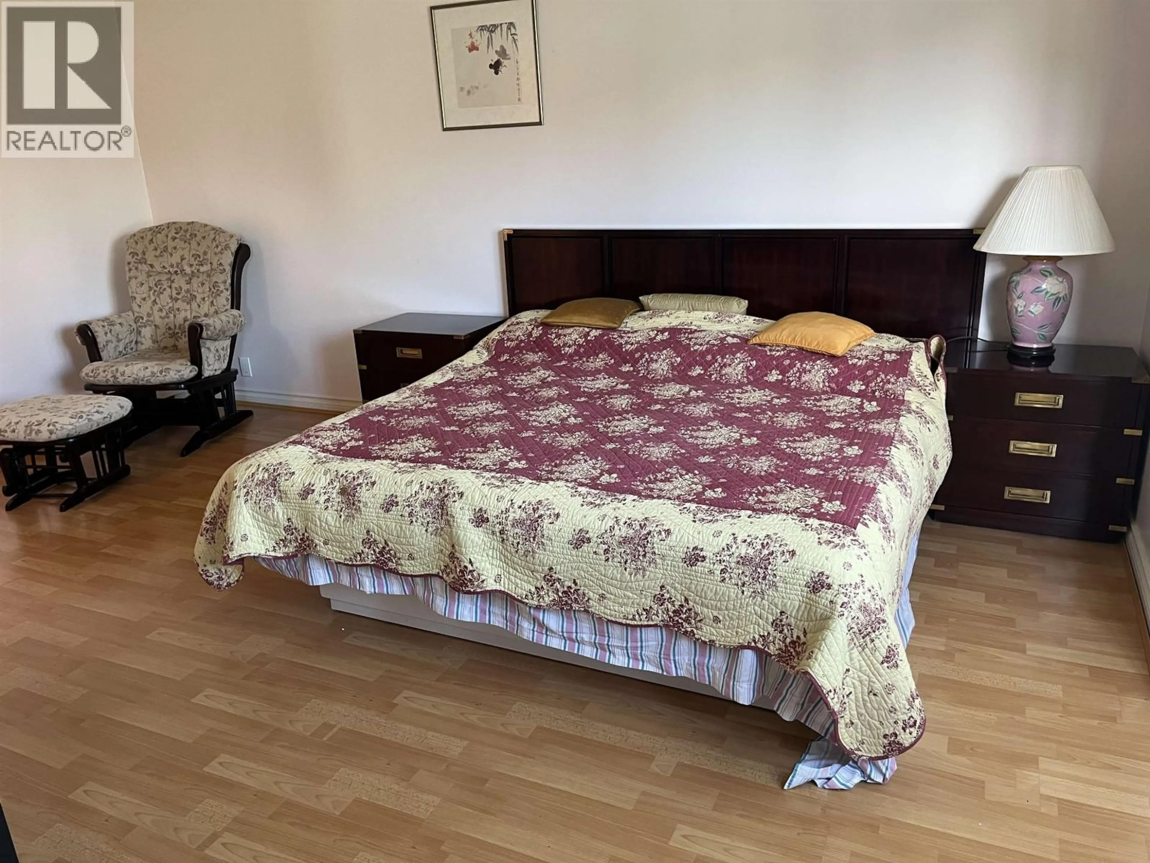 Bedroom with bed, wood/laminate floor for 2215 20TH AVENUE, Vancouver British Columbia V6L1G2