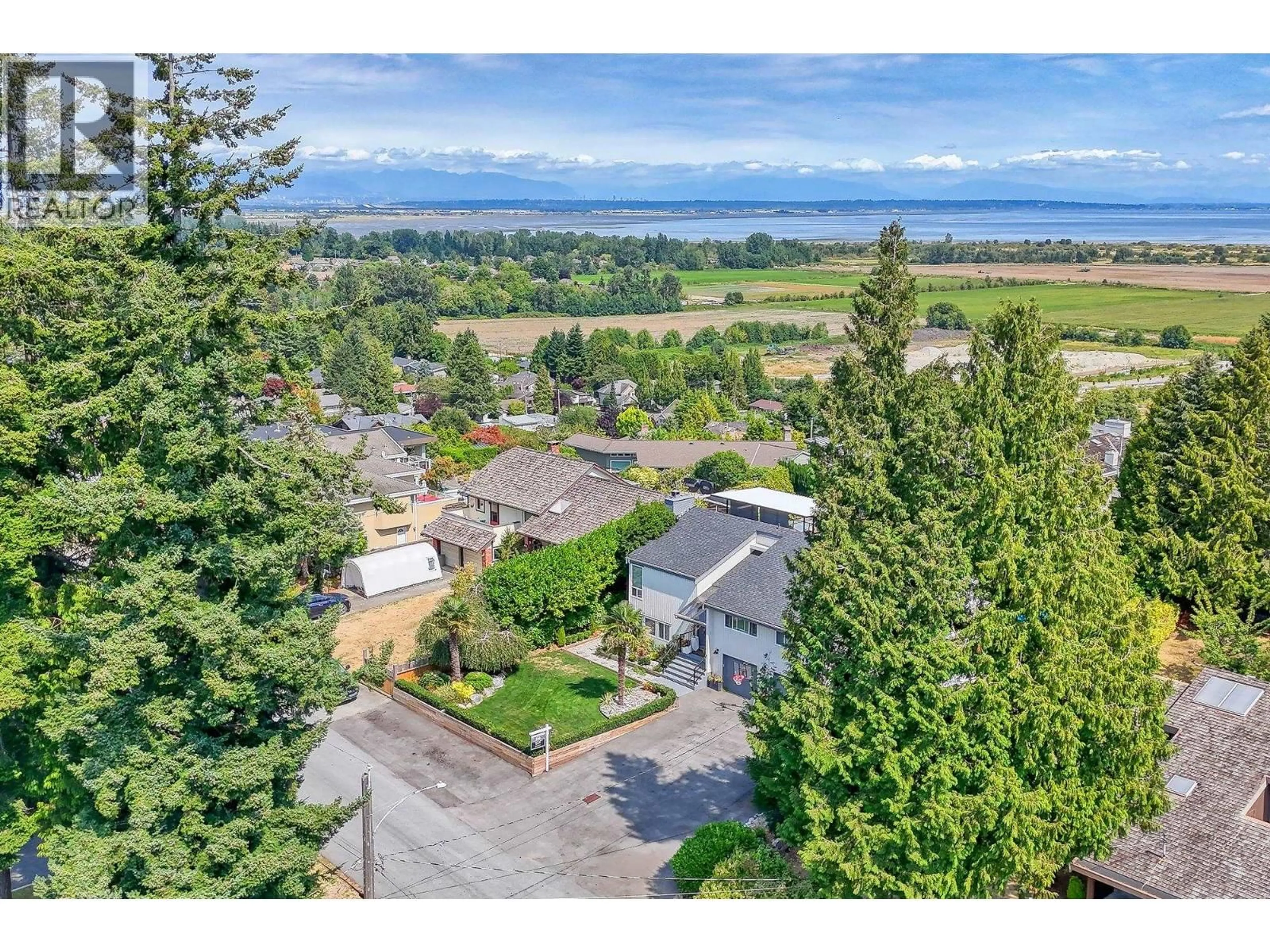 A pic from outside/outdoor area/front of a property/back of a property/a pic from drone, water/lake/river/ocean view for 284 54A STREET, Delta British Columbia V4M3J3