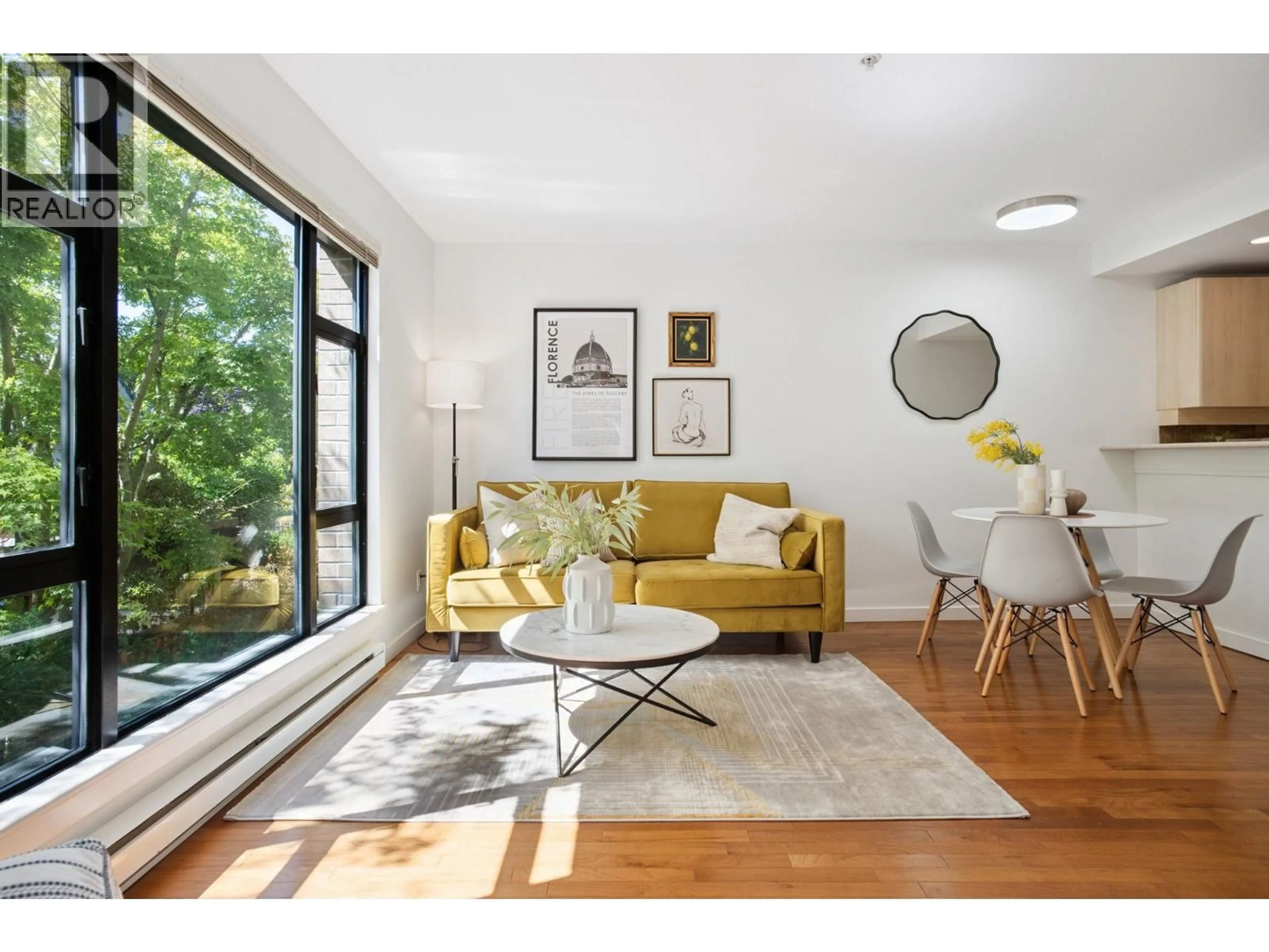 Living room with furniture, wood/laminate floor for 206 - 2226 12TH AVENUE, Vancouver British Columbia V6K2N5