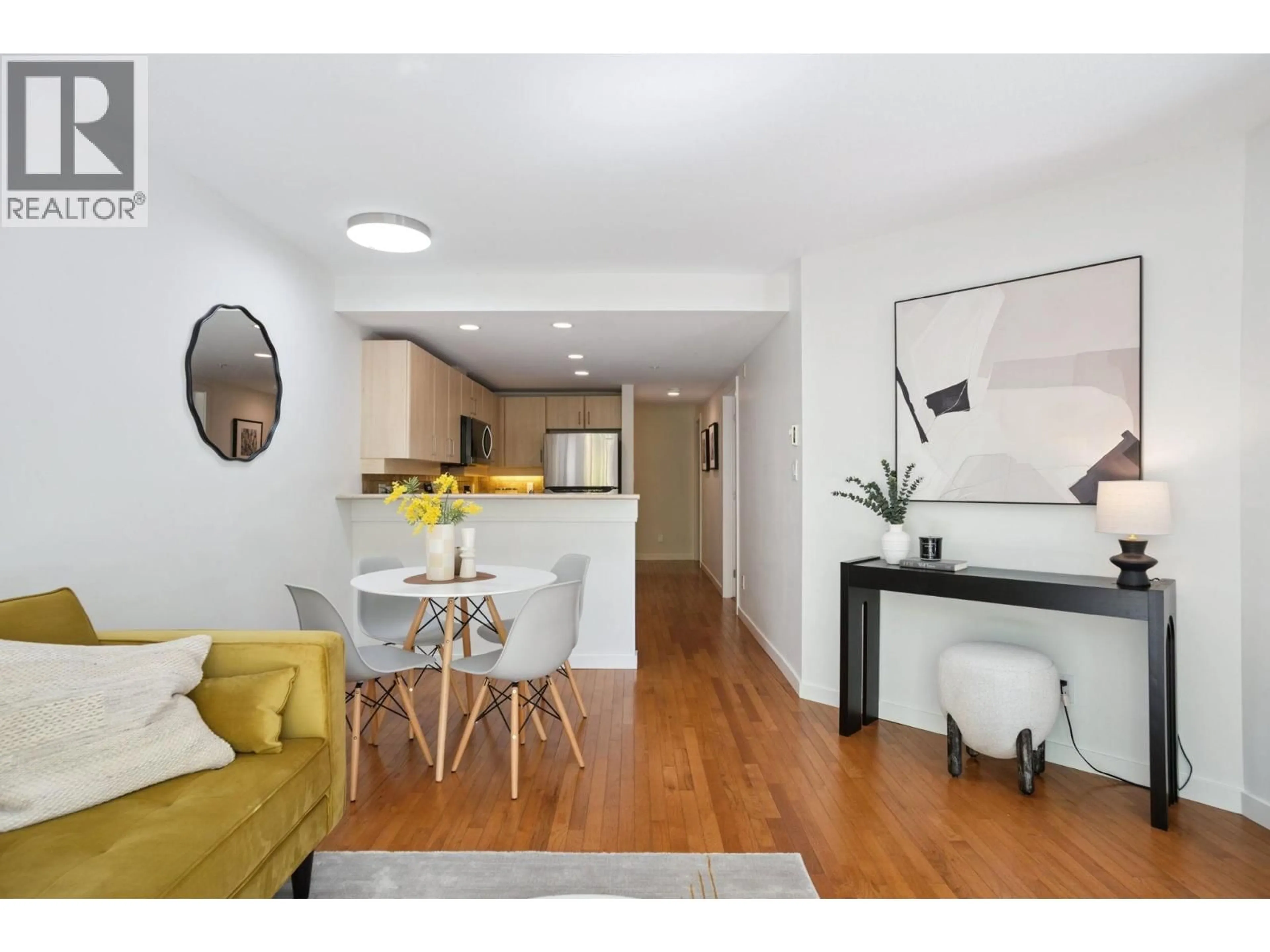 Open concept kitchen, wood/laminate floor for 206 - 2226 12TH AVENUE, Vancouver British Columbia V6K2N5