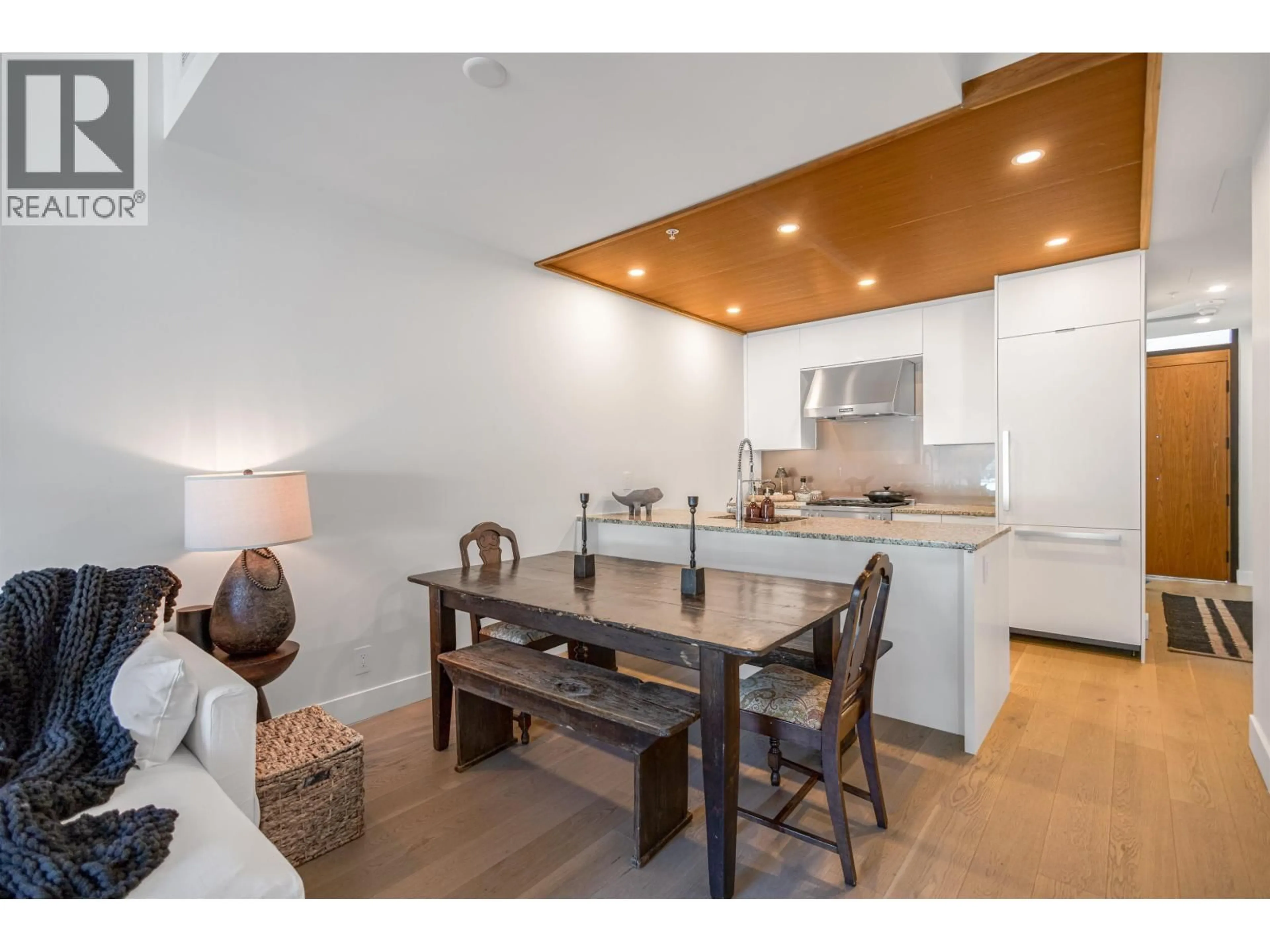 Open concept kitchen, wood/laminate floor for 408 - 6687 NELSON AVENUE, West Vancouver British Columbia V7W2B2