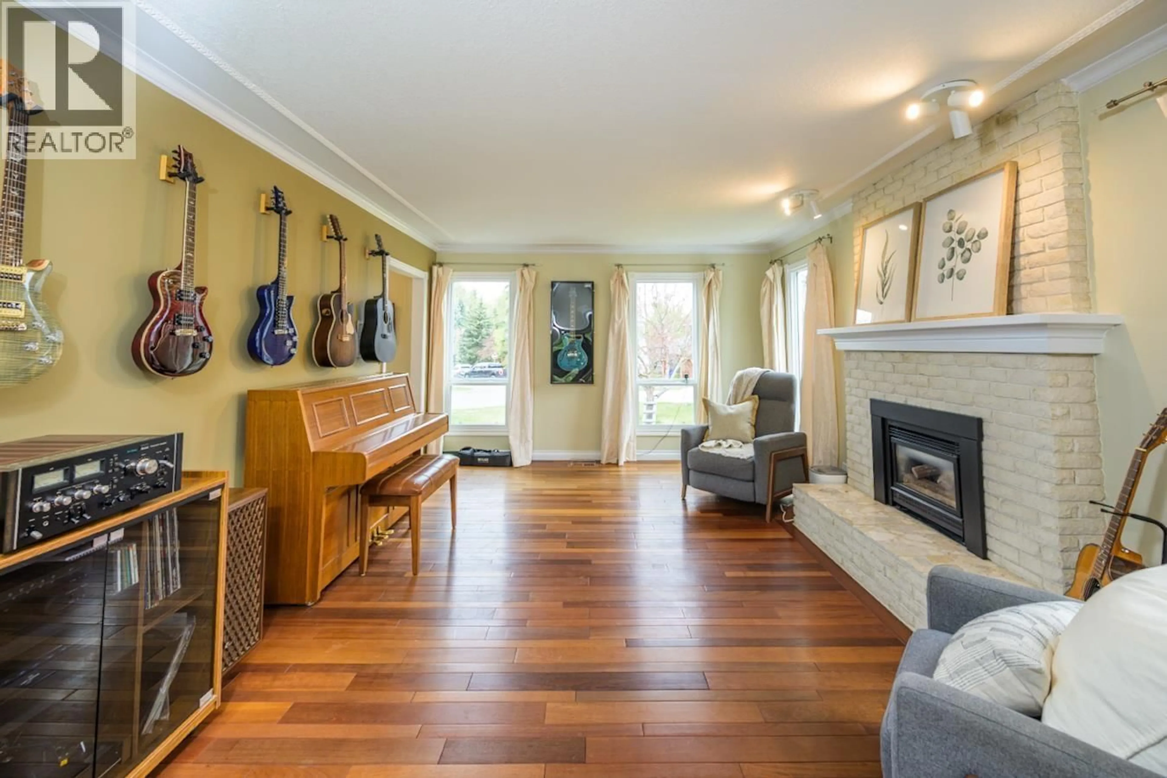 Living room with furniture, wood/laminate floor for 5542 MURRAY PLACE, Prince George British Columbia V2N3P4