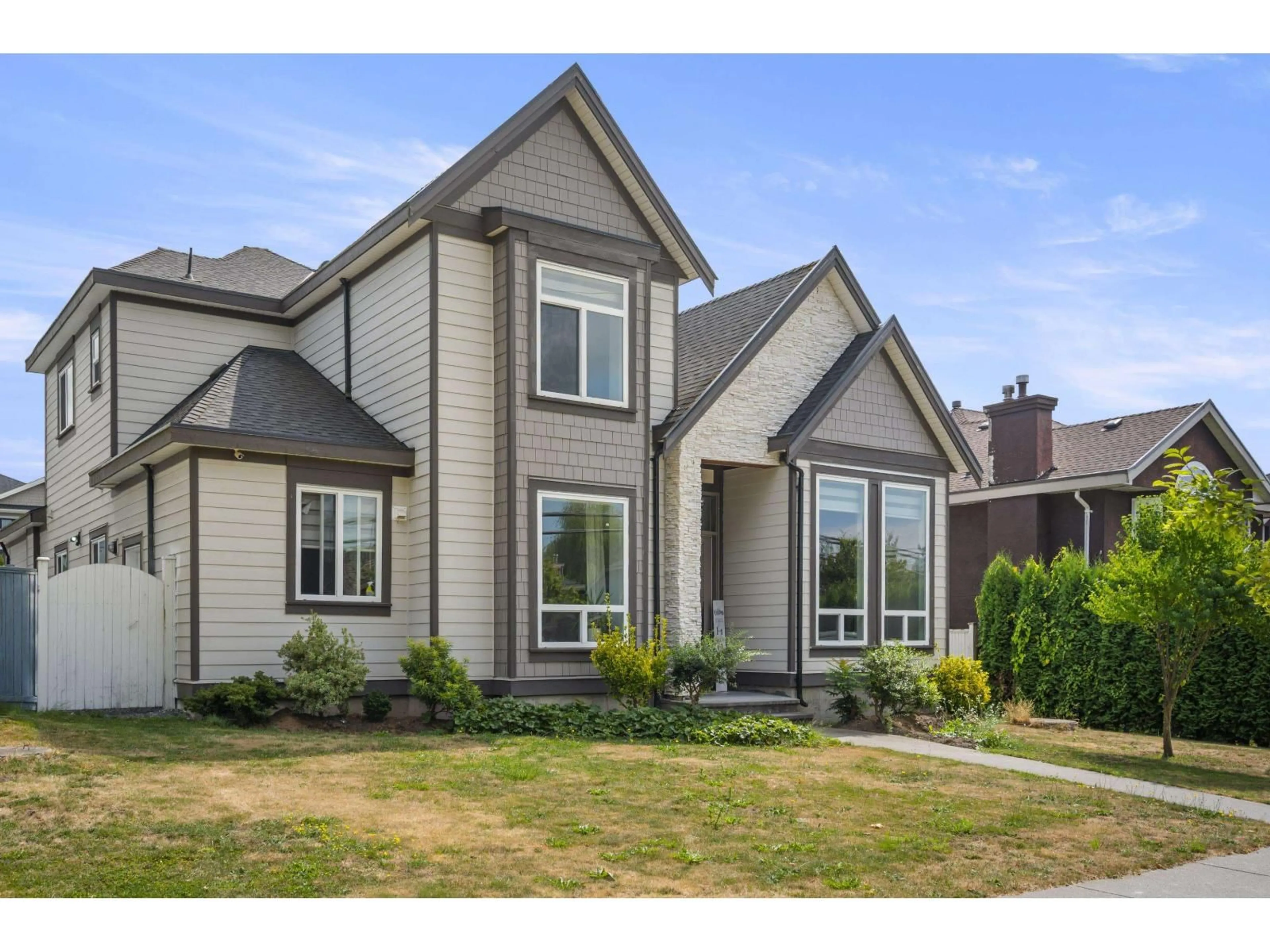 Home with vinyl exterior material, street for 10850 156 ST, Surrey British Columbia V3R6J6
