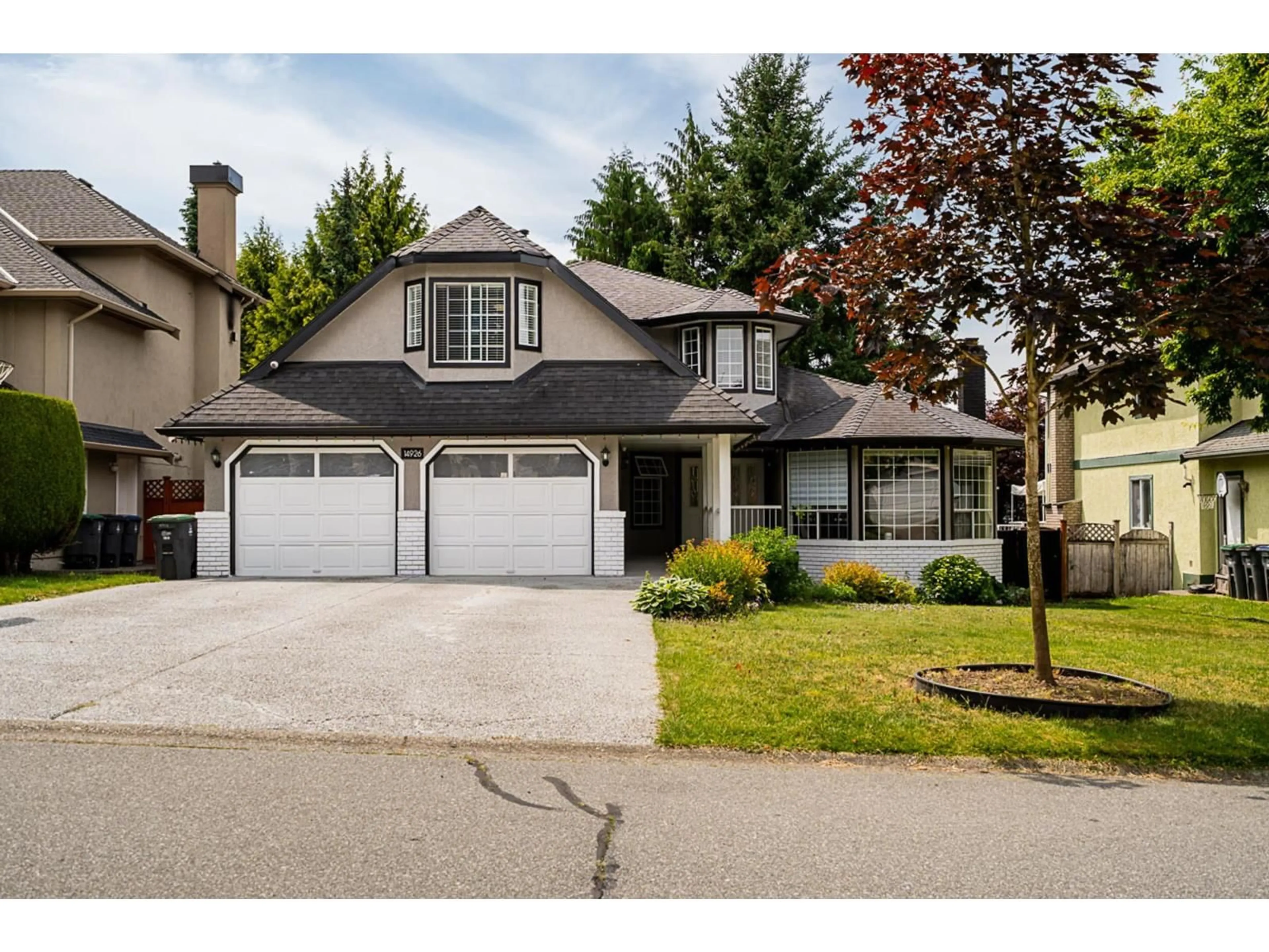 Home with vinyl exterior material, street for 14926 83A, Surrey British Columbia V3S7S2