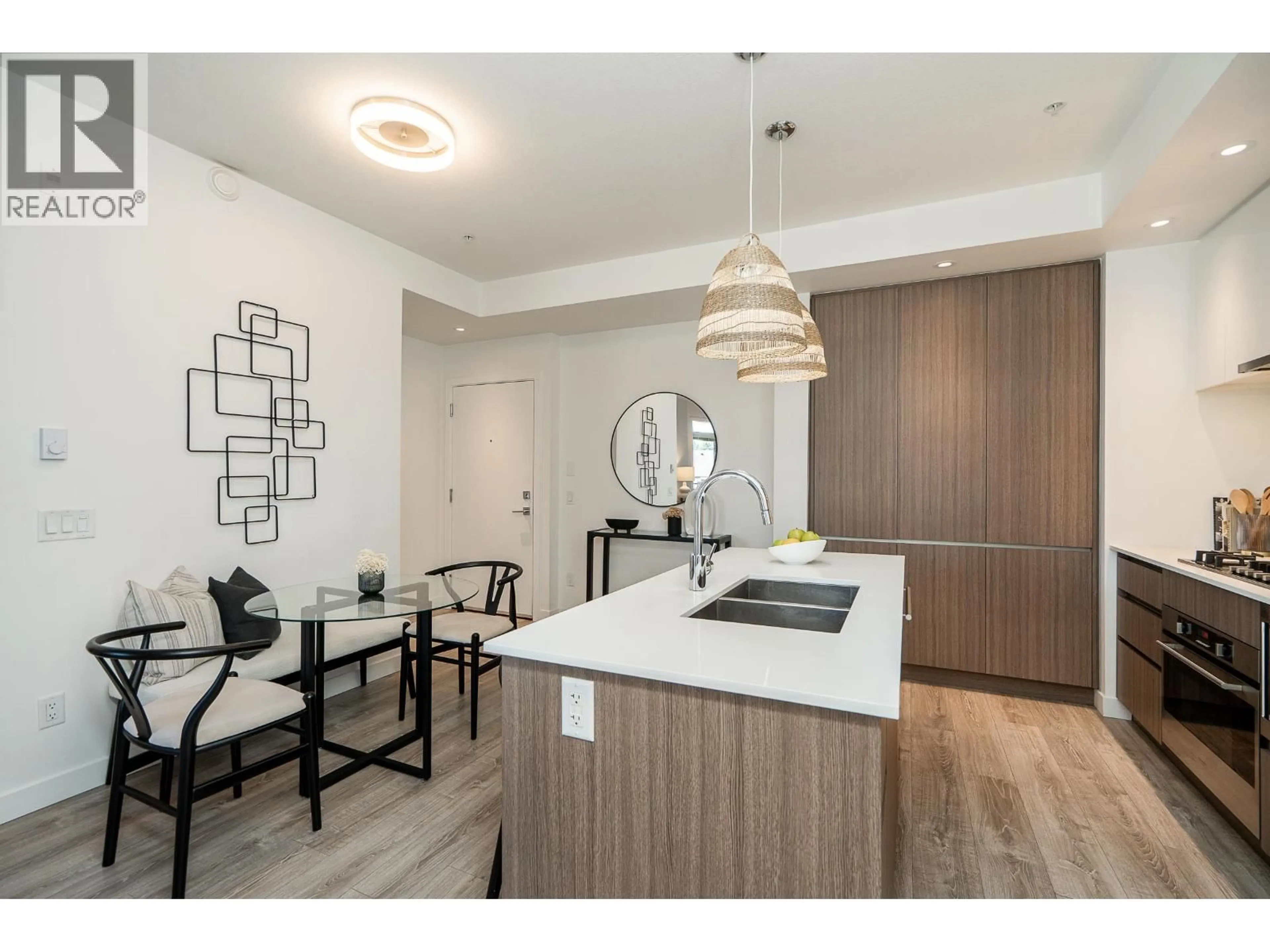 Open concept kitchen, wood/laminate floor for 401 - 516 FOSTER AVENUE, Coquitlam British Columbia V3J0H8