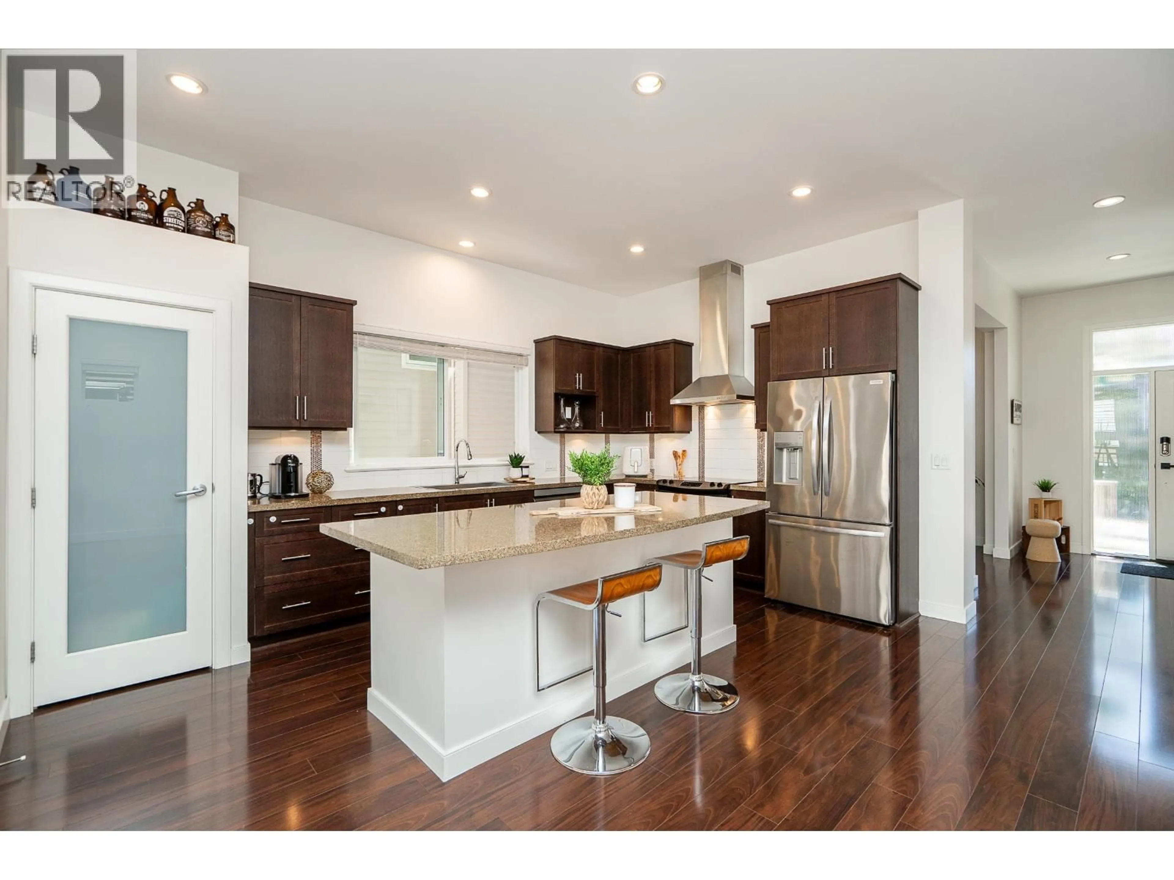 Open concept kitchen, wood/laminate floor for 3381 WATKINS AVENUE, Coquitlam British Columbia V3E0B3