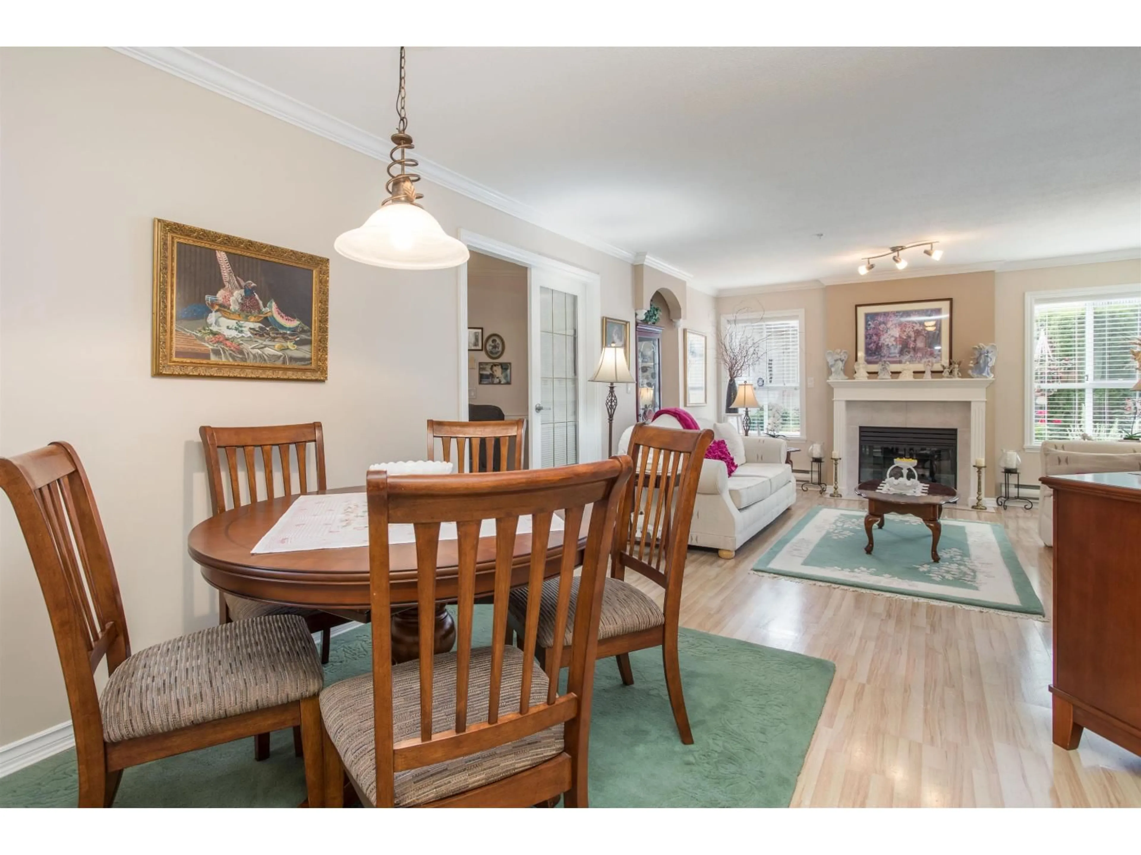 Dining room, wood/laminate floor for 107 - 15272 20, Surrey British Columbia V4A2A3