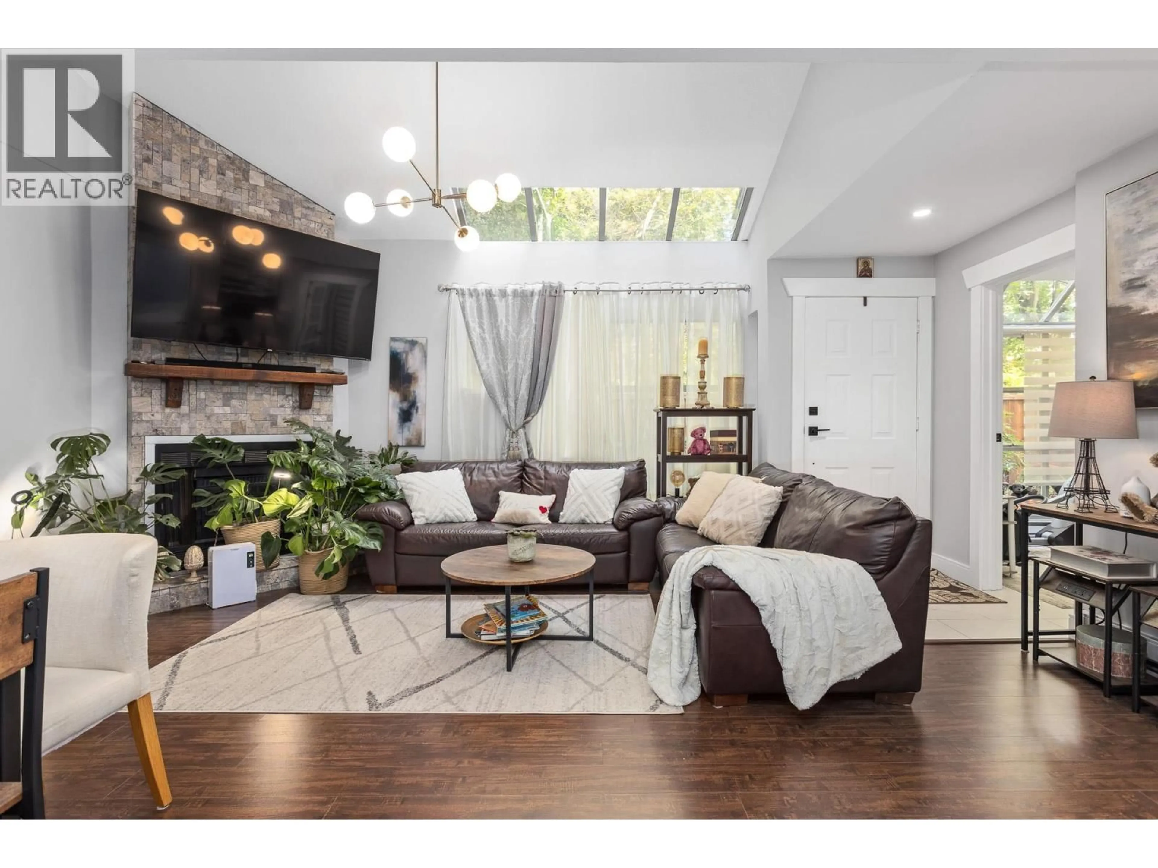 Living room with furniture, wood/laminate floor for 15 - 7540 ABERCROMBIE DRIVE, Richmond British Columbia V6Y3J8